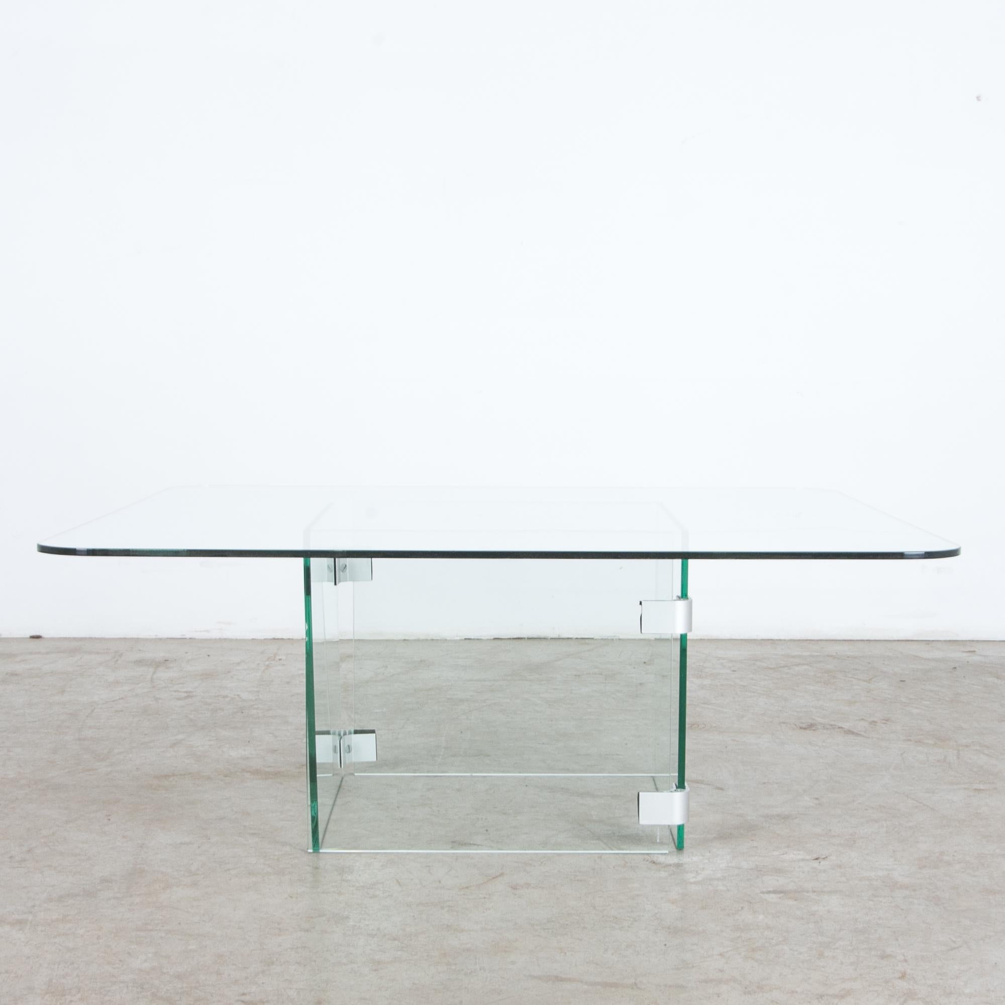 A minimal approach typifies this 1960s coffee table, a sleek and stylish element from Midcentury Italy. Fresh and simple, this mid-20th century piece captures the classic materials of Modernism, metal and glass, in a refined and elegant package.
