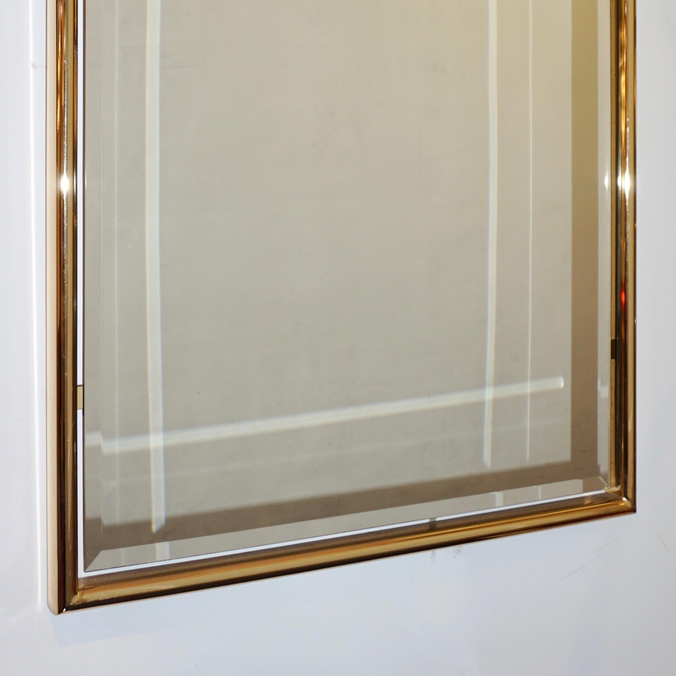 Hand-Crafted 1960s Italian Minimalist Brass Floating Mirror with Round Arched Top Frame For Sale