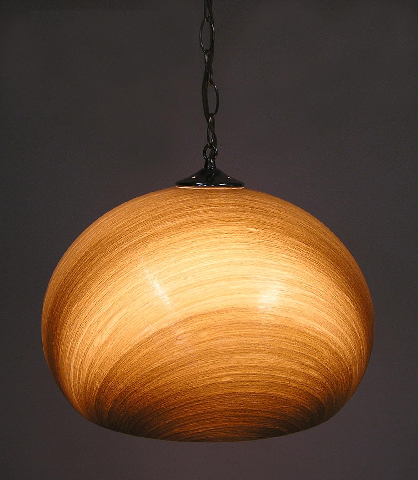 A spun fiberglass pendant lamp from the 1960s attributed to Harvey Guzzini of Italy. Stunning Italian Modern design featuring a large spun fiberglass shade. Approximate cord length is 12 feet and lamp operates via a switch located near the cords