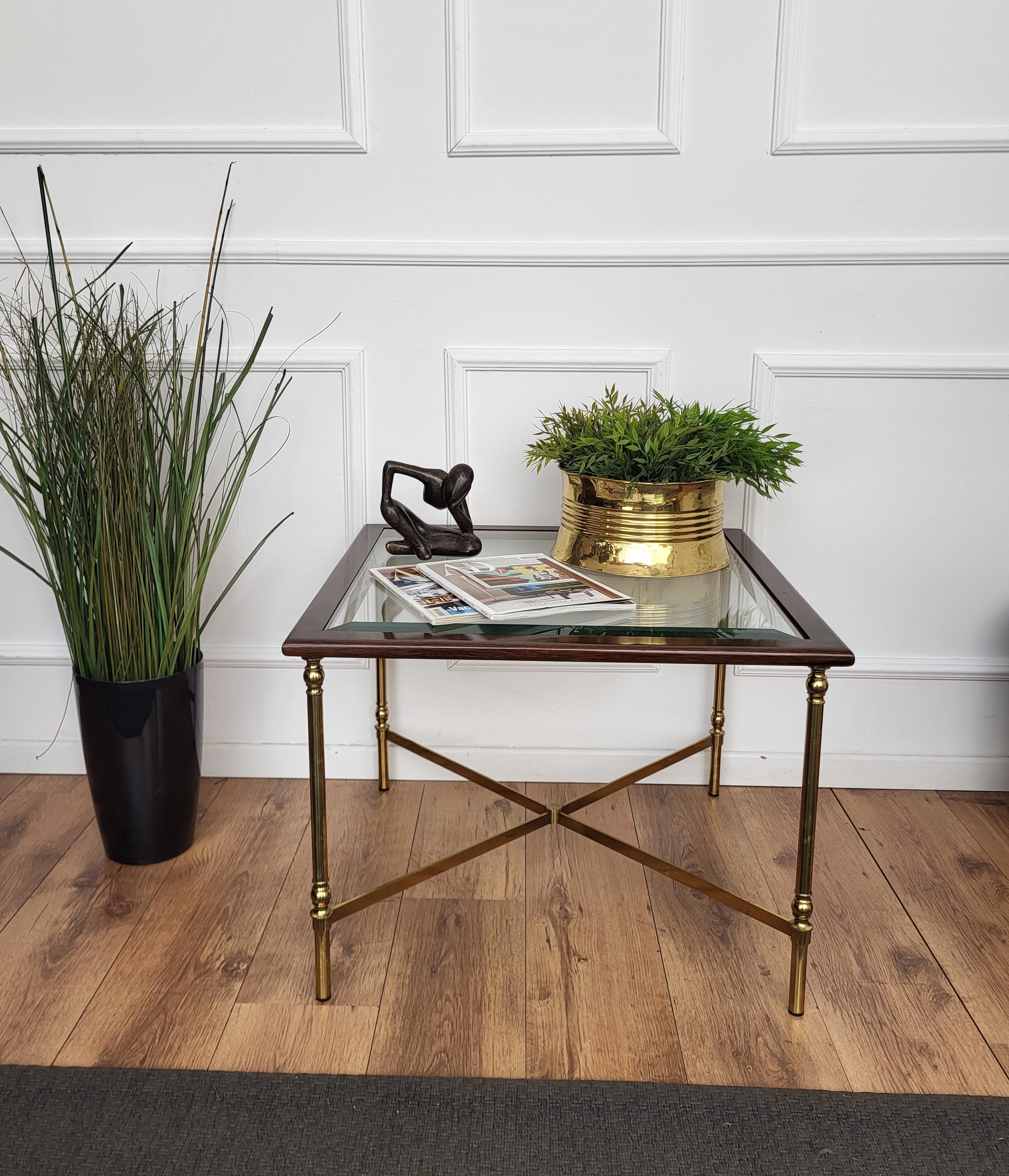 Beautiful and stylish vintage 1980s Italian brass wood and glass side table or coffee table or sofa table. Very good condition with great brass and beveled glass. A great piece that perfectly adds to every home decor the typical glitz, glamour and