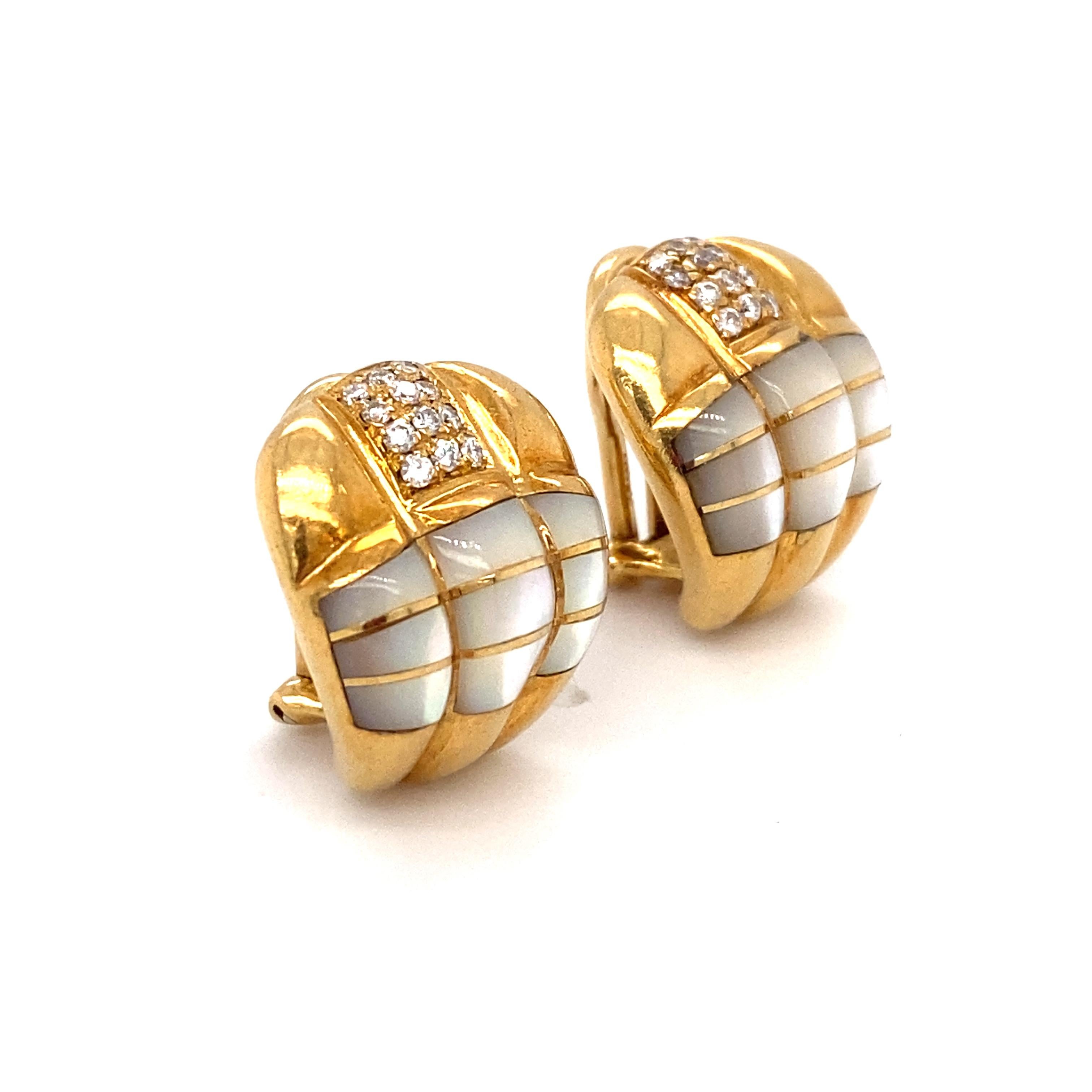 Item Details: These unique clip on earrings have a cobra-like design with rich mother of pearl and accent diamonds.

Circa: 1960s
Metal Type: 18 Karat Yellow Gold
Weight: 16.6 Grams
Dimensions: 0.75 Inch Length

Diamond Details:

Carat: 0.40 carat