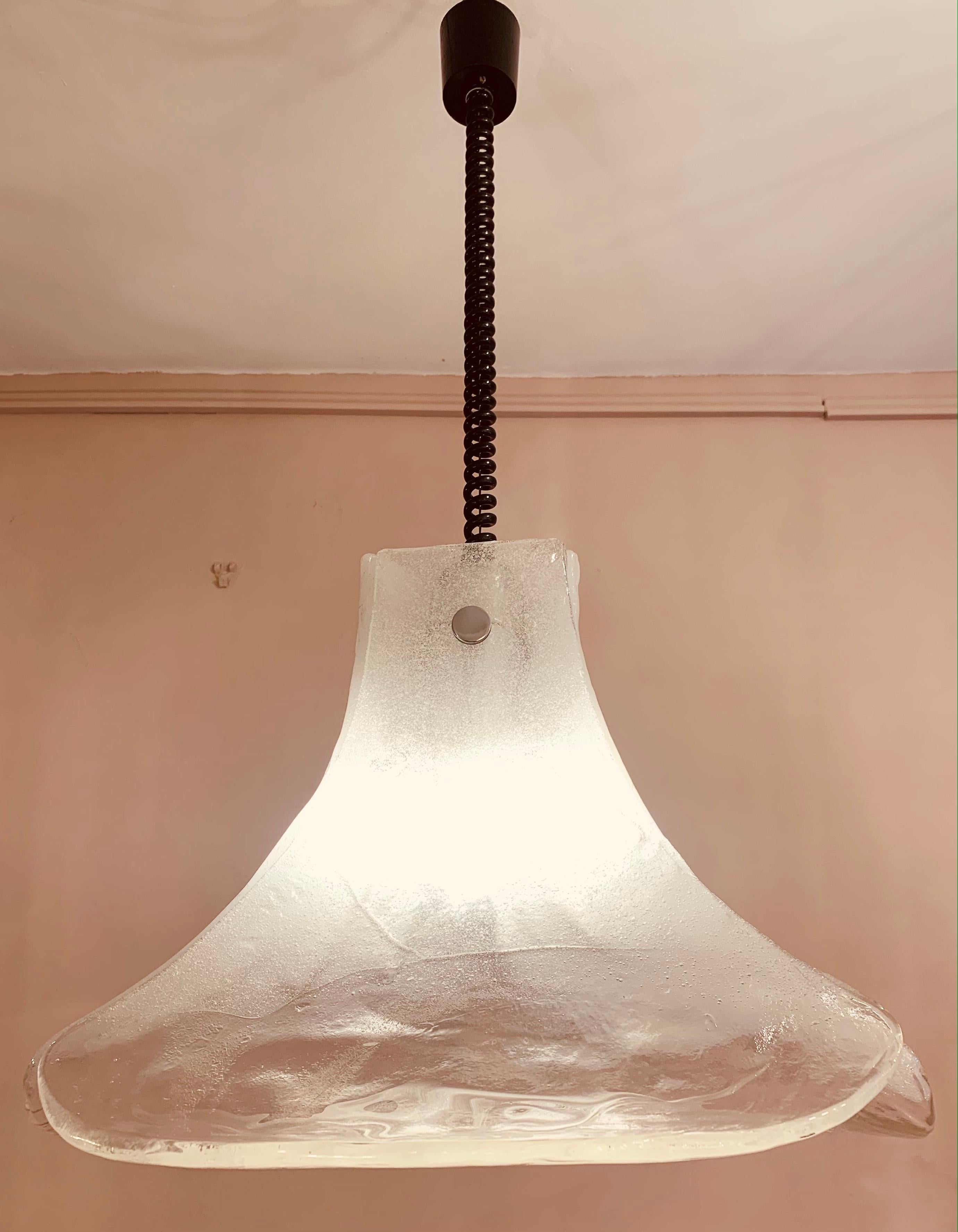 1960s Italian Murano glass hanging pendant light designed by Carlo Nason for AV Mazzega. The three thick glass petals are held onto the frame with a single screw in each. The suspension light is height adjustable based on your requirements. The iced