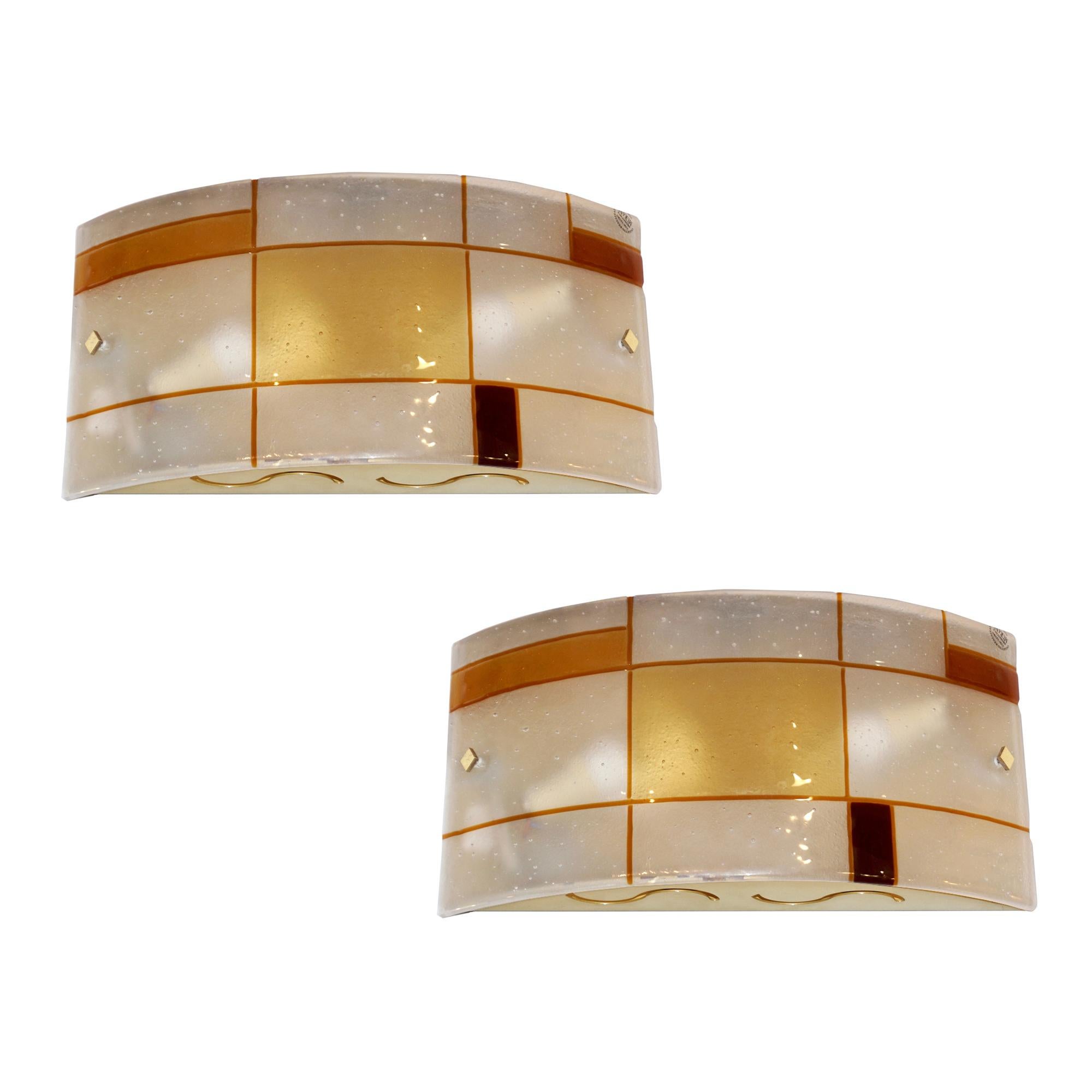 A set of 4 (2 pairs) available - vintage Mid-Century Modern Italian one-of-a-kind pair of handcrafted curved wall lights or flush mounts in high quality frosted Murano glass worked with the technique Pulegoso: numerous small bubbles that make the
