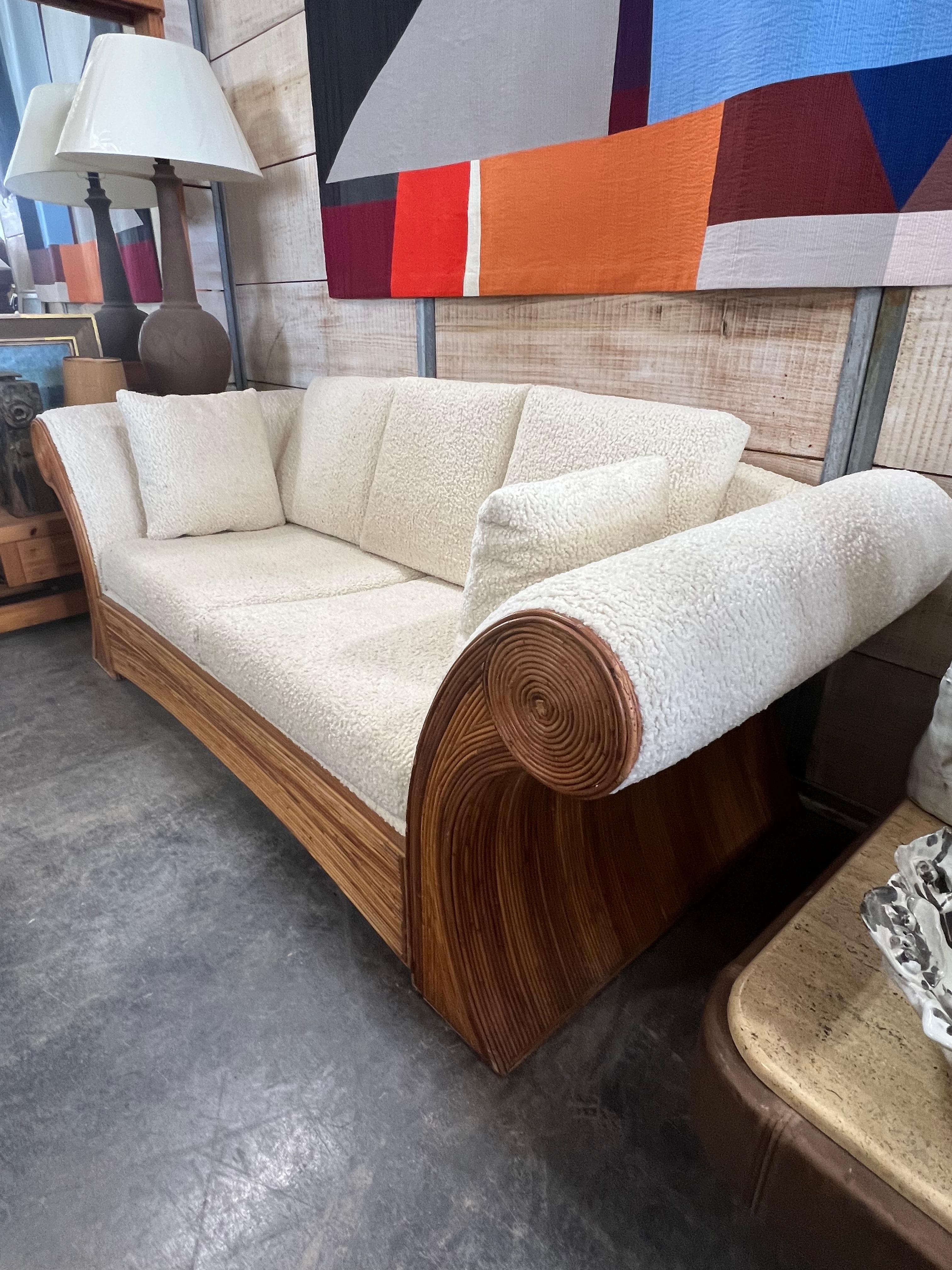 1960’s Italian pencil Reed sofa with new upholstery.