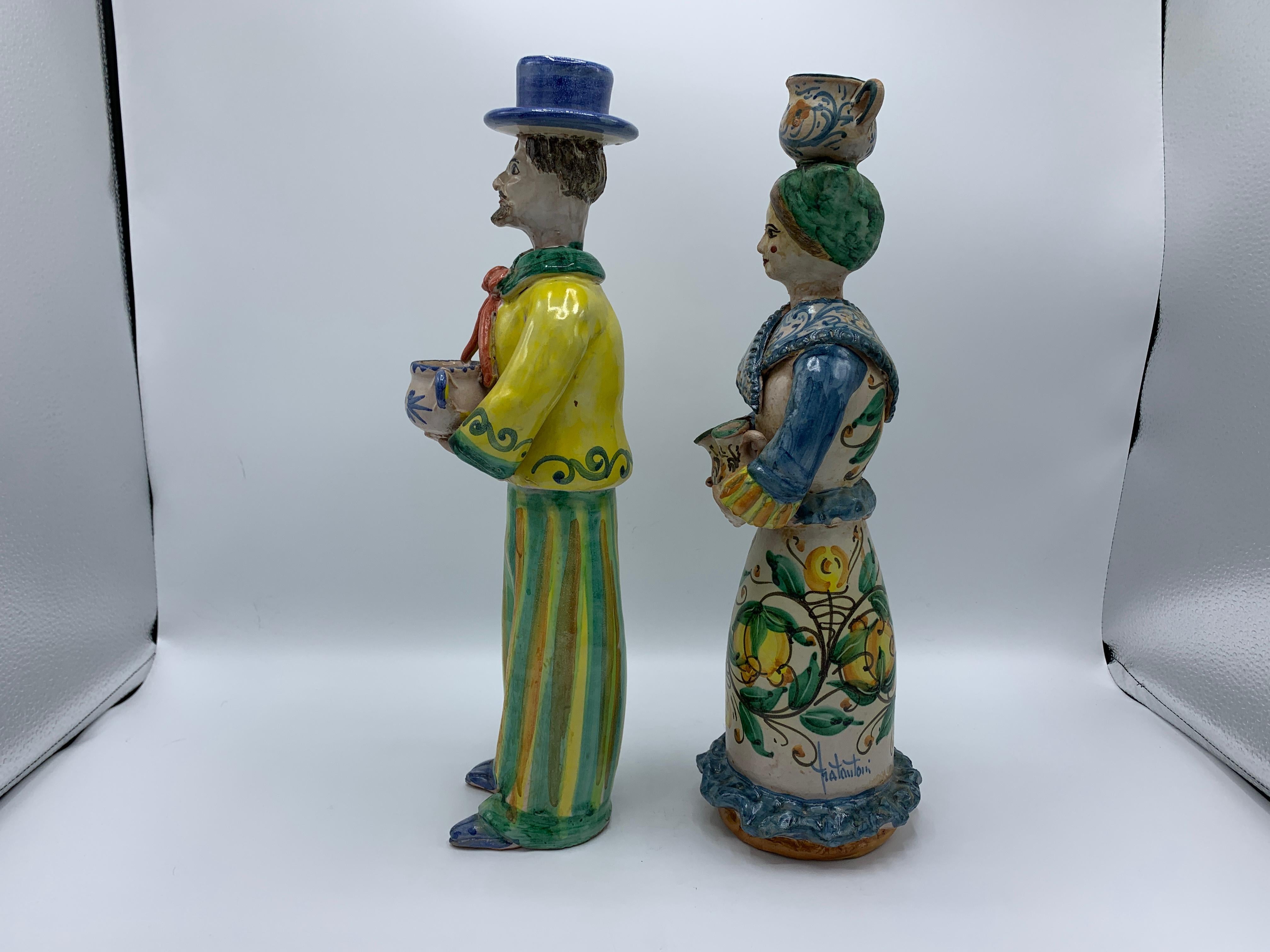 Listed is a beautiful, pair of 1960s Italian polychrome terracotta pottery sculptures, for Vietri. The pair are of amazing quality and attention to detail.

Heavy, weighing 4.5lbs each - 9lbs for the pair.

Varying heights.
Male: 3.5in D x