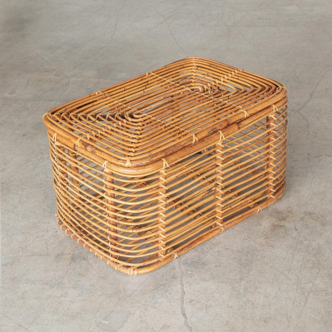 Unique rattan and bamboo basket/ trunk from Italy, 1960's. Rectangular shape with hinged top and open rattan construction. Perfect to hold blankets, toys, or for additional storage. Beautiful original rattan finish.