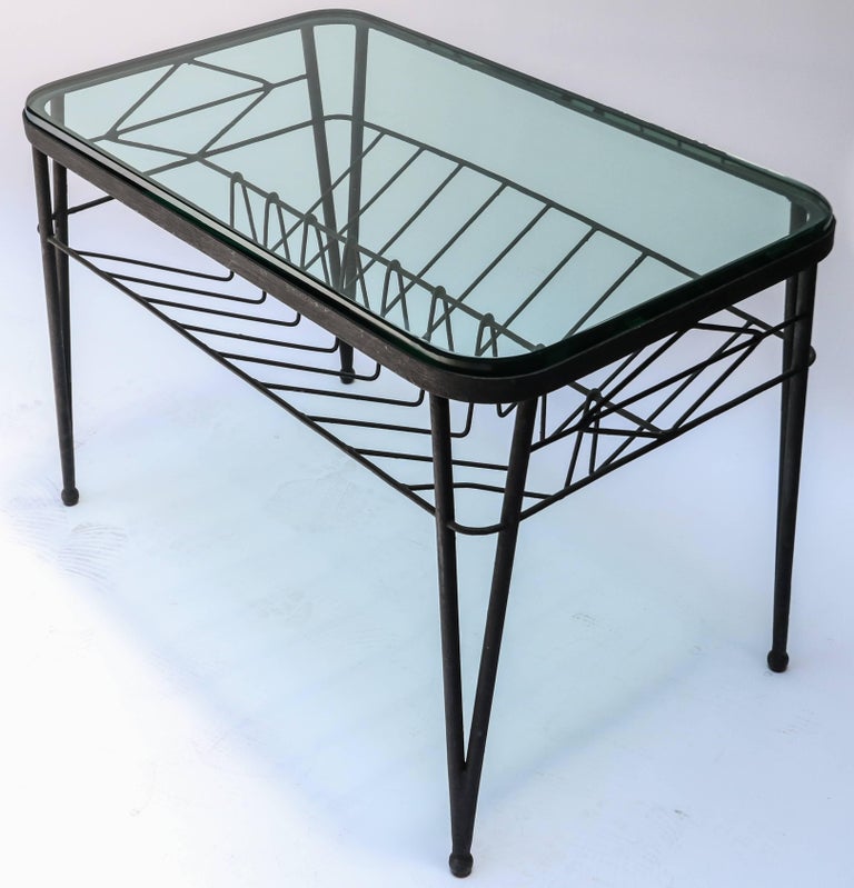 Rectangular black metal Italian side table from the 1960s with glass top.