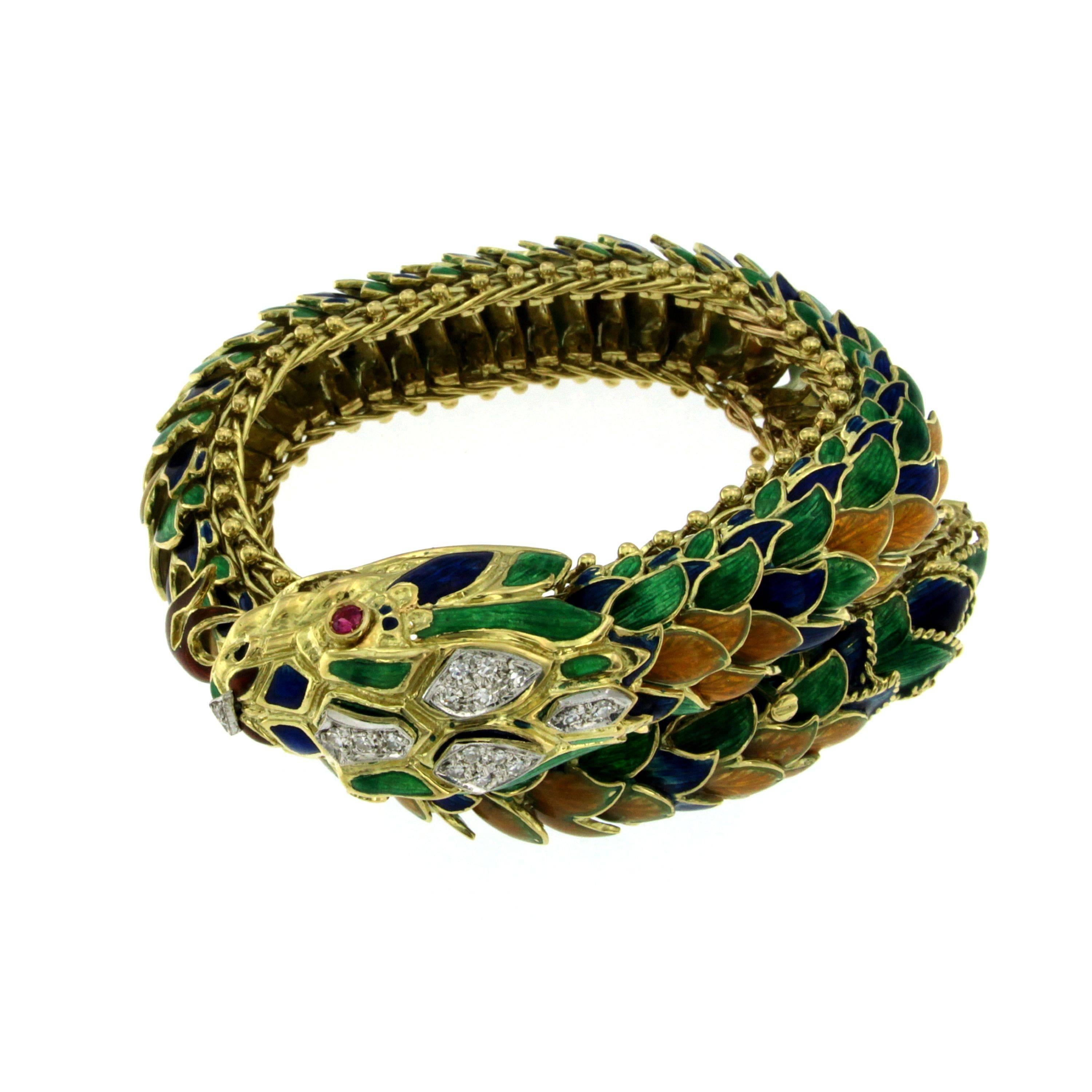 Impressive diamond, ruby, enamel 9.80 inches of reptilian-inspried fine jewelry… Intense blue, green and orange enamel scales gently lift and move as you don this lovely bracelet. Resembling a dragon's tail or colorful serpent, this is a masterfully