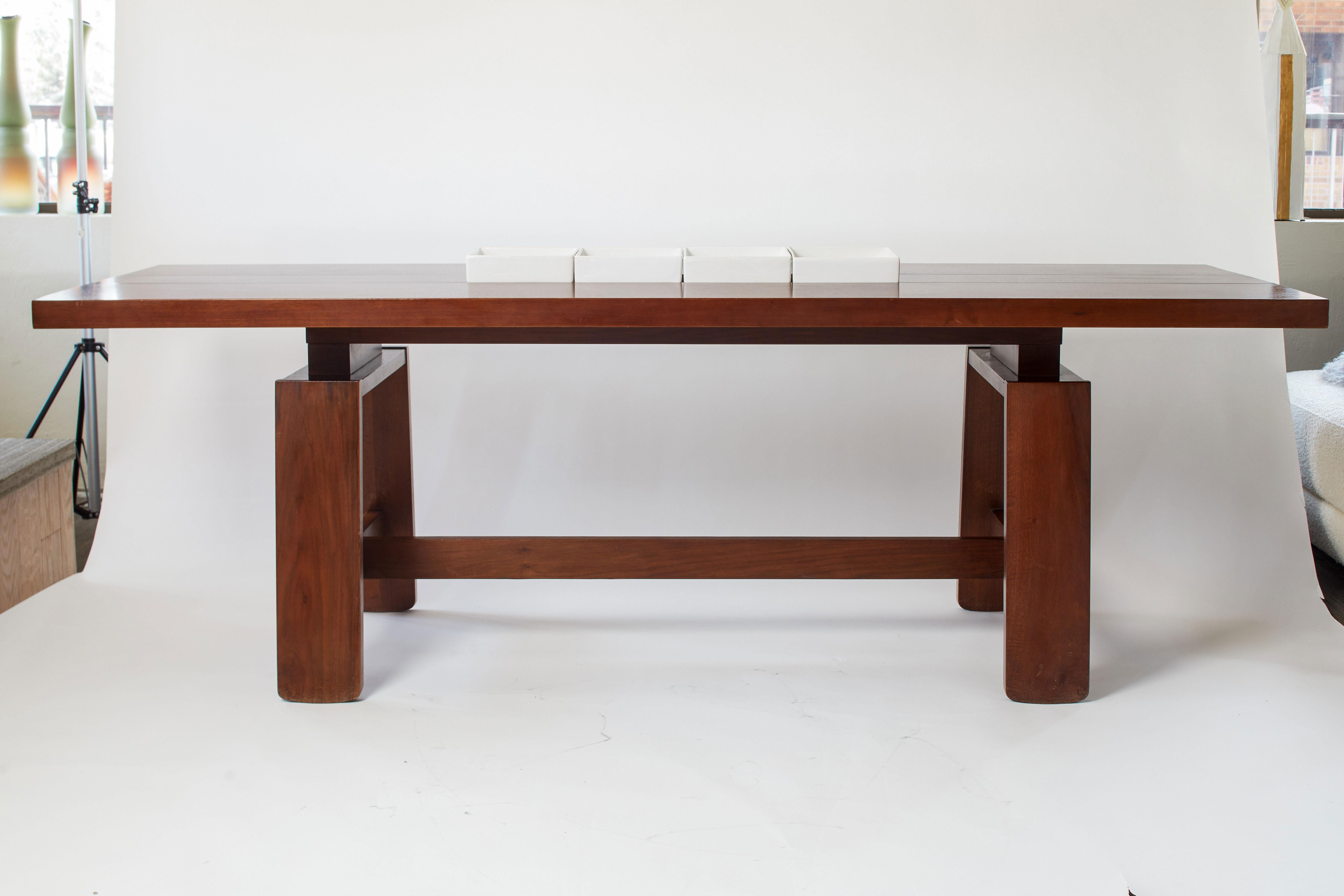 Mahogany dining table with 4 Ceramic inserts and wood tray. Ceramic inserts are removable. Documented Silvio Coppola piece. Designed for Berniini furniture company. Includes 4 stamped porcelain serving dishes/trays which can be inserted for use or