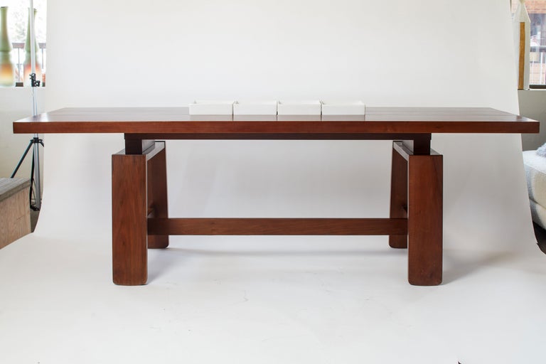 Mahogany dining table with 4 Ceramic inserts and wood tray. Ceramic inserts are removable. Documented Silvio Coppola piece. Designed for Berniini furniture company. Includes 4 stamped porcelain serving dishes/trays which can be inserted for use or