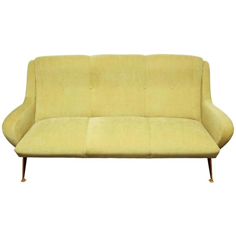 Mid-Century Modern sofa in lime green velvet with brass legs in the style of Marco Zanuso. Italian, 1960's.