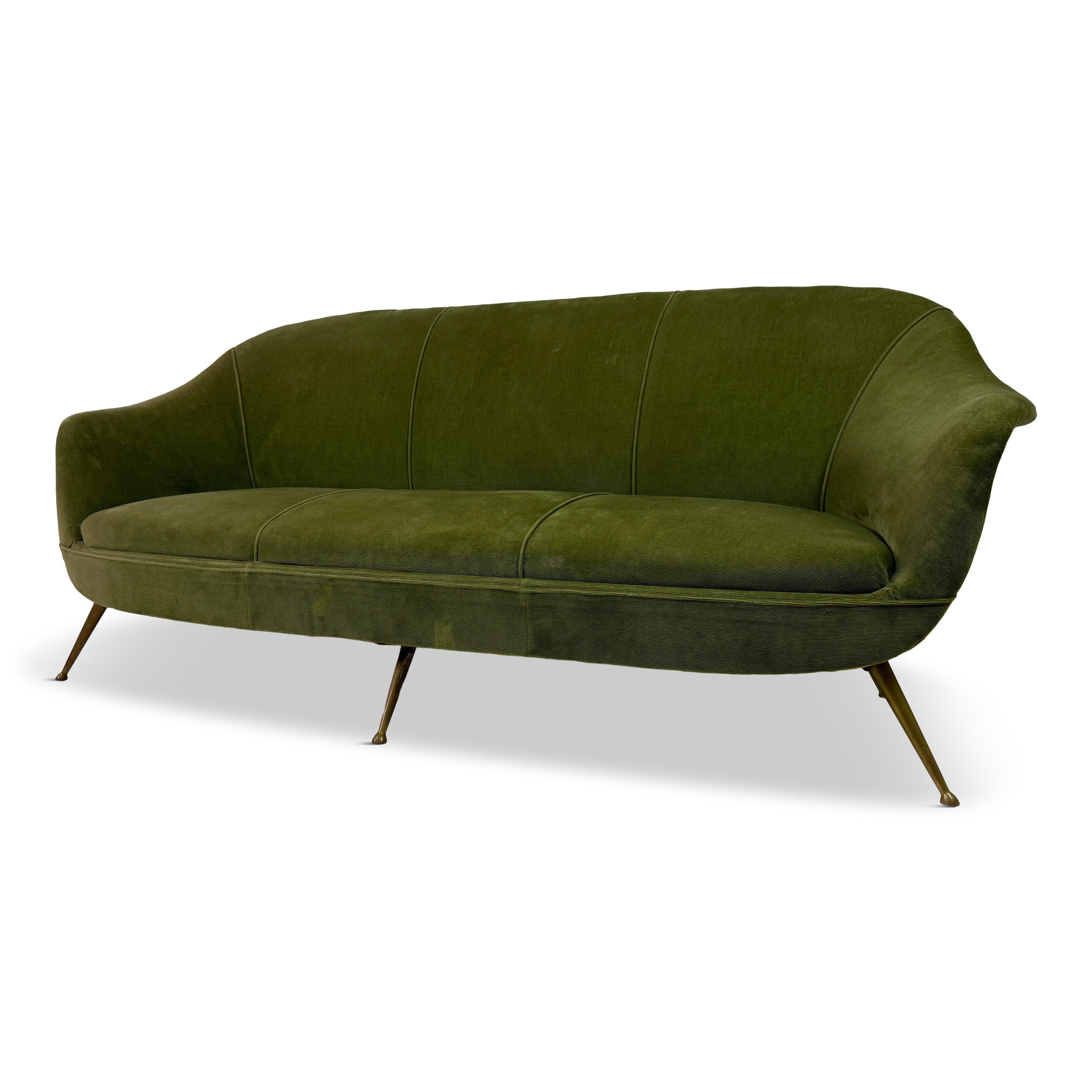 Sofa

Organic flowing shape

Lipped arm rests

Brass feet

Italy 1960s

Please note that the fabric is not new and shows signs of age and use. Reupholstery is possible before purchase.
