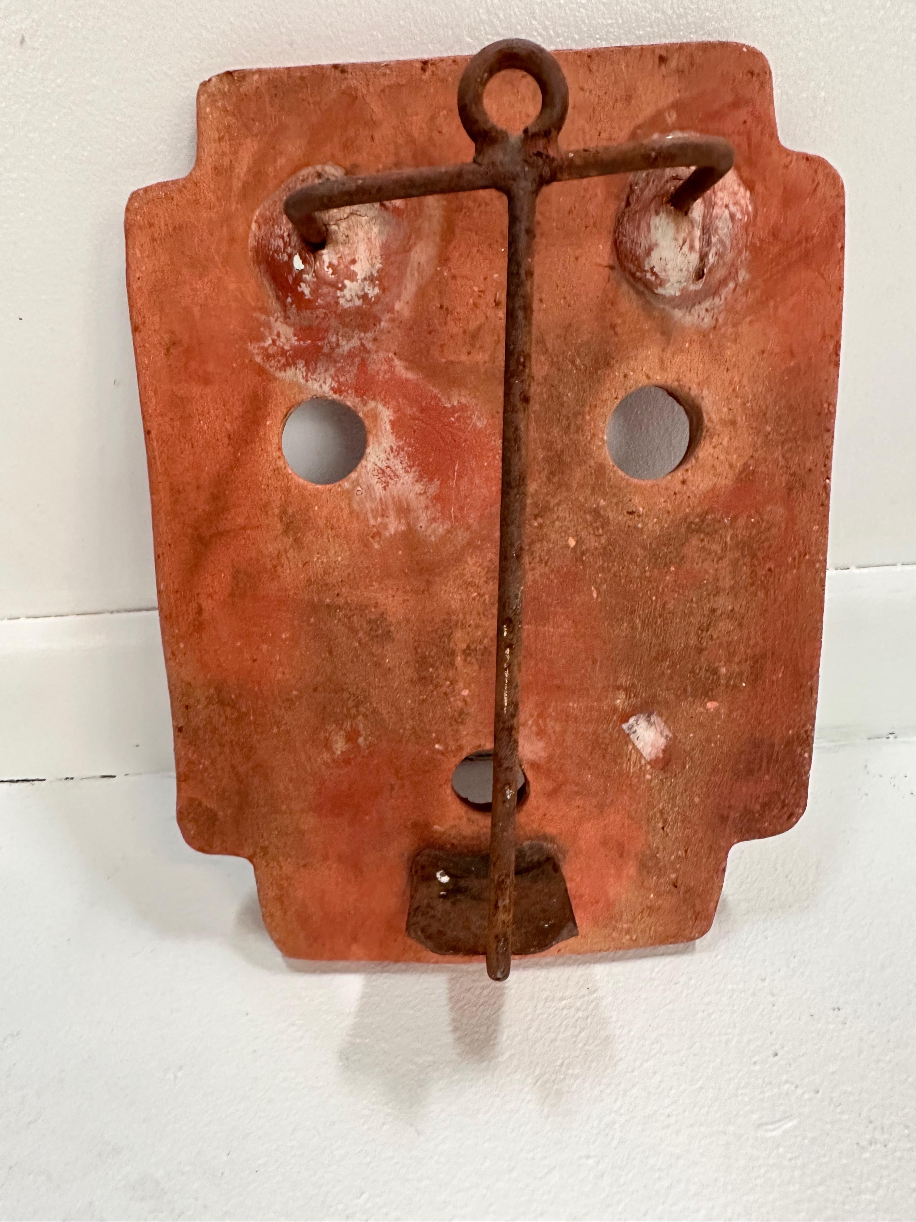 Mid-Century Modern 1960s Italian Terracotta Mask Candle Sconce For Sale