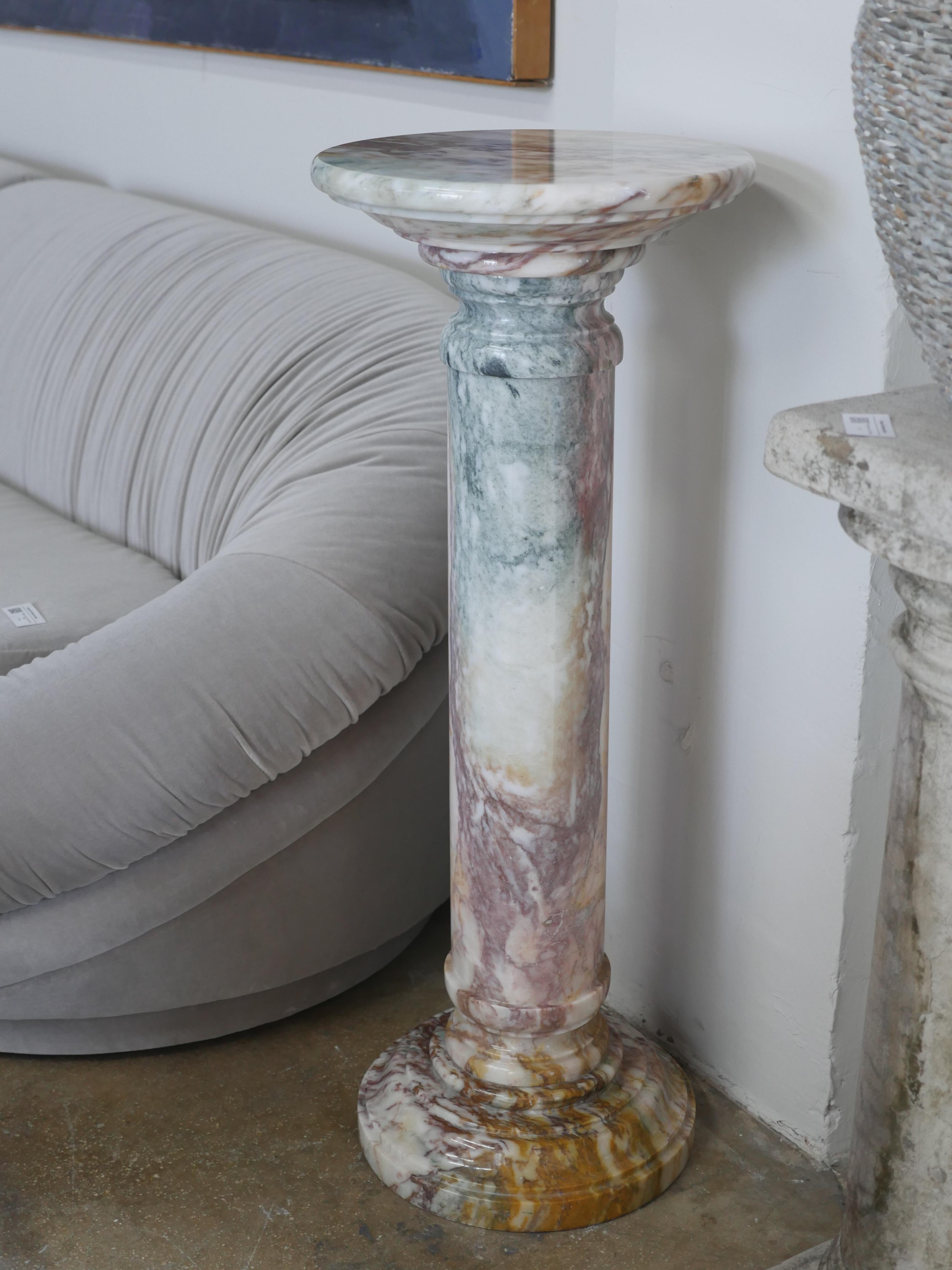 1960s Italian made, Viola Calcutta, polished solid marble pedestal. With it's exotic highly variegated veins this vintage pedestal is perfect for displaying your favorite sculpture, plant and adding a nice touch of character to the room. 


