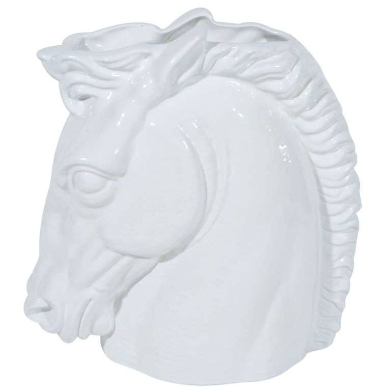 Mid-Century Modern handcrafted horse head sculpture with white glaze finish. Also functions as decorative vase or centerpiece with stunning profile and detail. Has illegible signature and marking on the underside.