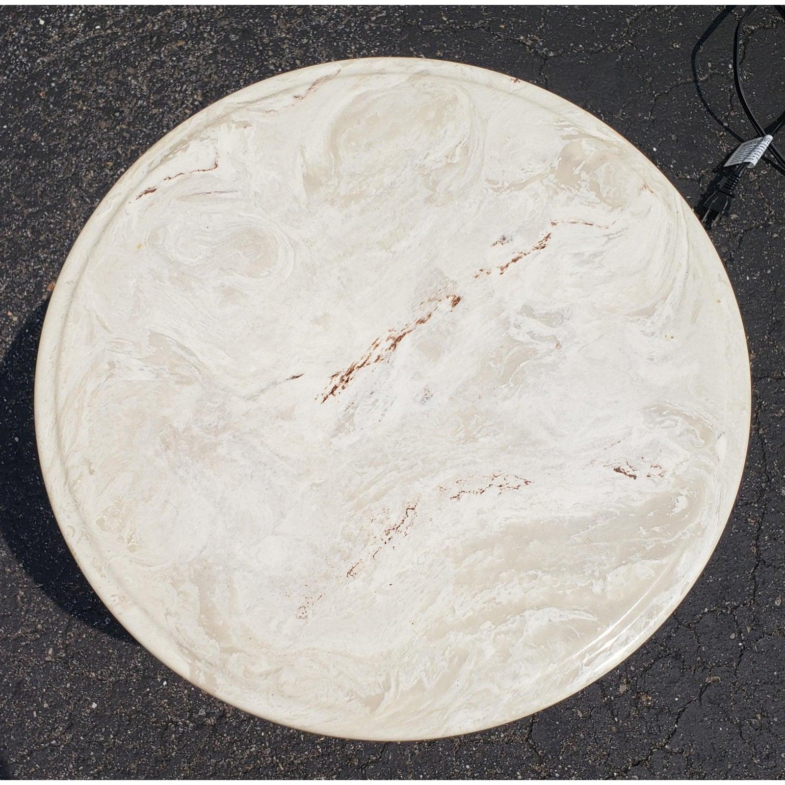 White onyx stone top with carved base padestal accent table in excellent condition. Carved Base embellished with elephant head and a thick gold ring. No chips or whatsoever. Minor signs of use .
Table measures 18W x 18D x 17H.