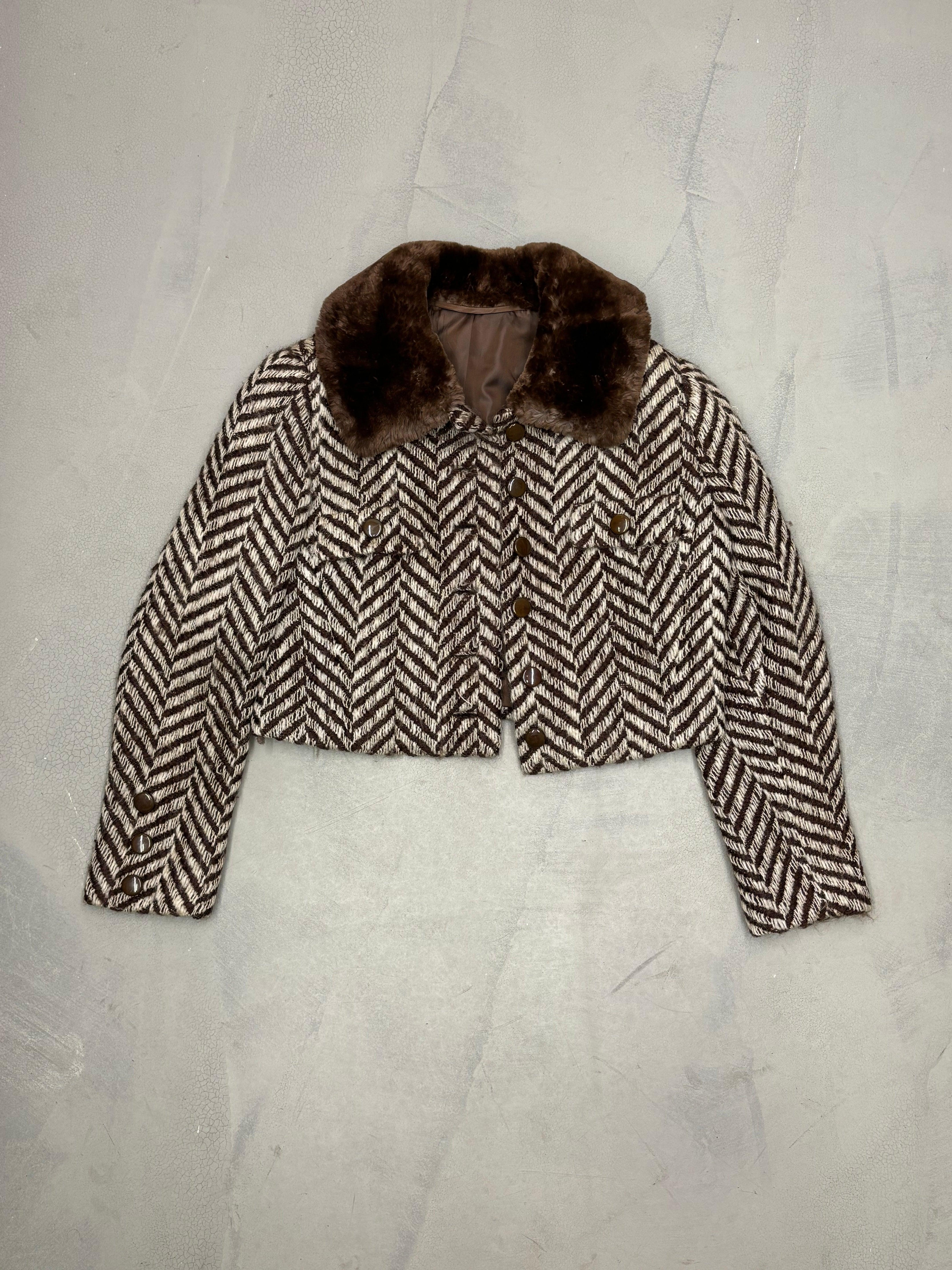 Italian vintage tailor-made jacket and dress set from the 1960's

Wool brown set with brown fur trim
Cropped jacket with fur collar
Typical 60's fit and flare dress 
Harringbone wool motif
Size label missing, fits M

Jacket - Total length: 40 cm -