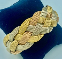 Vintage 1960s Italian yellow, white and rose 18 carat gold plaited bracelet 