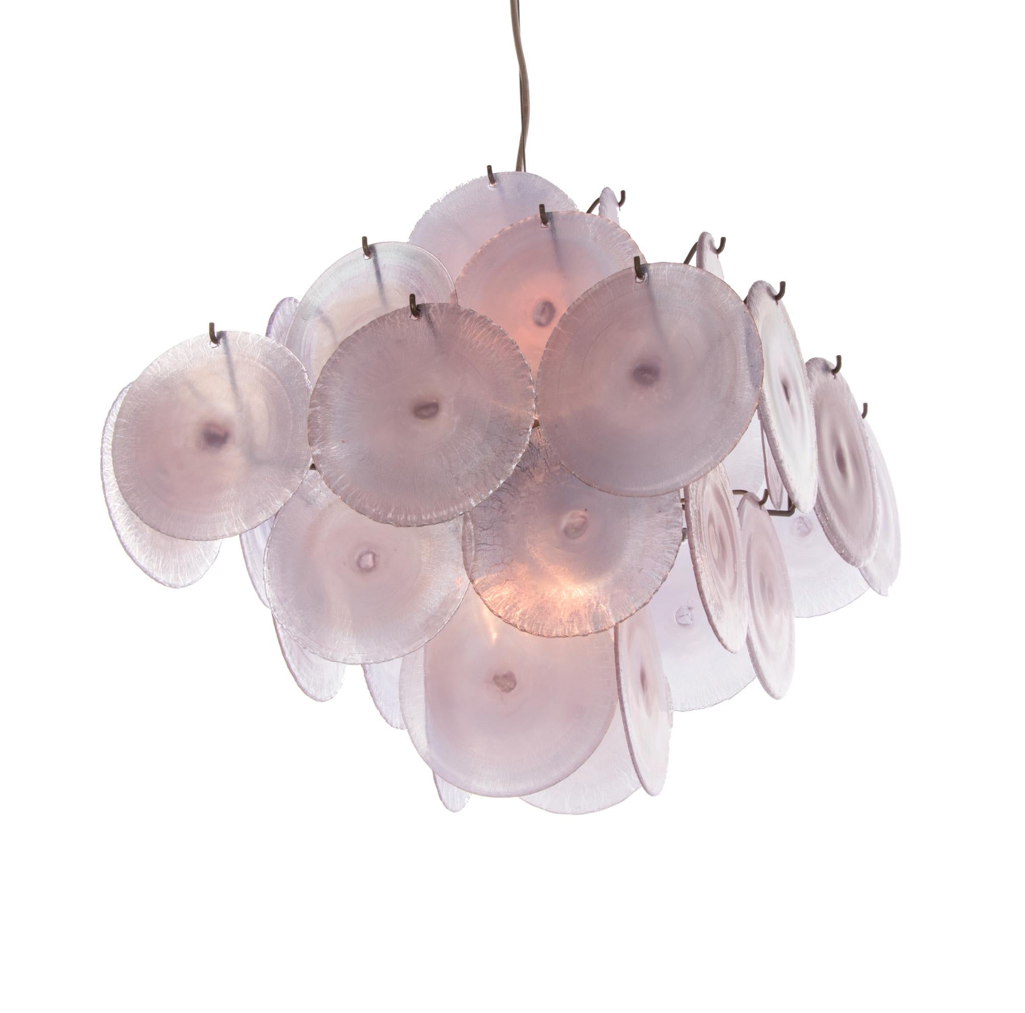 Elegant chandelier with iridescent, pearl-like discs with crinkled edges arranged on five levels on a chromed sputnik frame. The color of the glasses changes when lit from a pale blue to amethyst. Chandelier illuminates beautifully and offers a lot