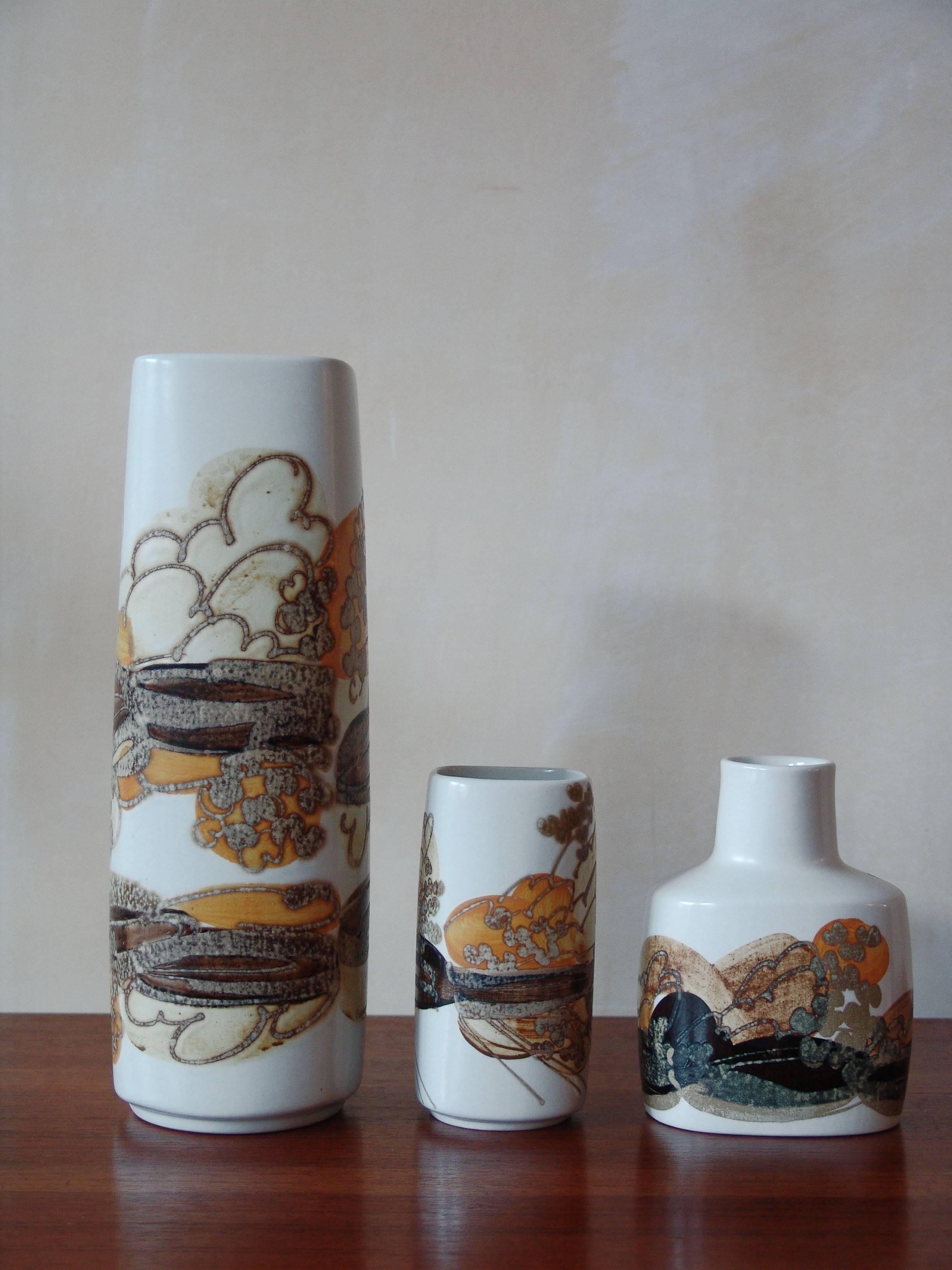 Set of Scandinavian Mid-Century Modern ceramic vases designed by Ivan Weiss for Royal Copenhagen with the manufacturer's signature on the bottom, circa 1960s.
Dimensions from left (picture number 1) height 27 cm, height 12.5 cm, height 13 cm.