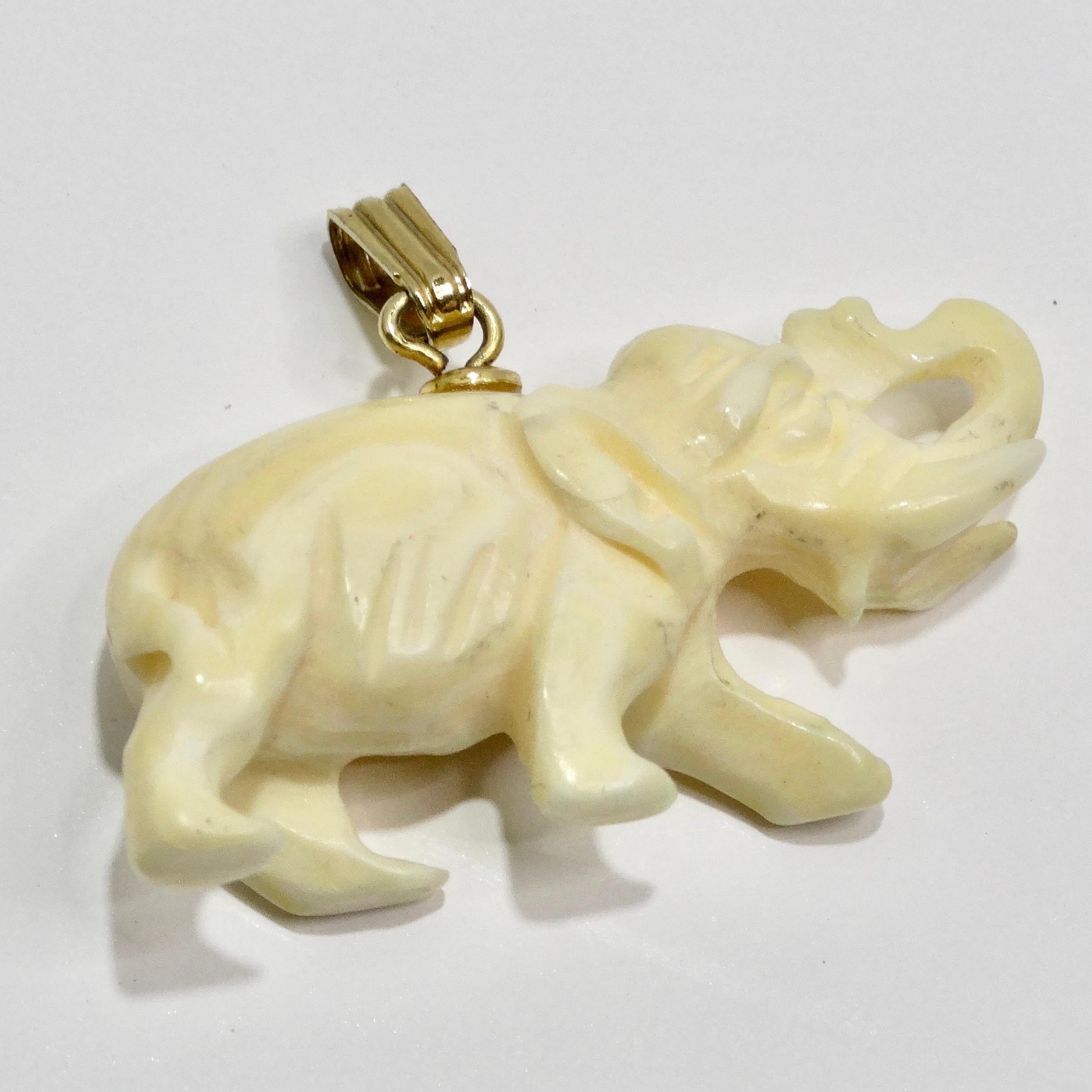 Introducing the 1960s Ivory Elephant Pendant, a vintage piece that combines delicate charm with subtle uniqueness. This beautiful pendant features an intricately carved elephant, symbolizing strength, wisdom, and good fortune. Crafted in luxurious
