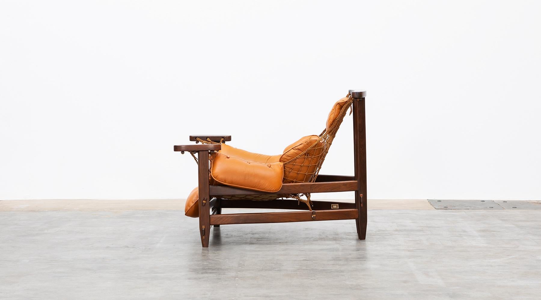 Mid-Century Modern 1960s wood, leather cushion Lounge Chair and Ottoman by Jean Gillon