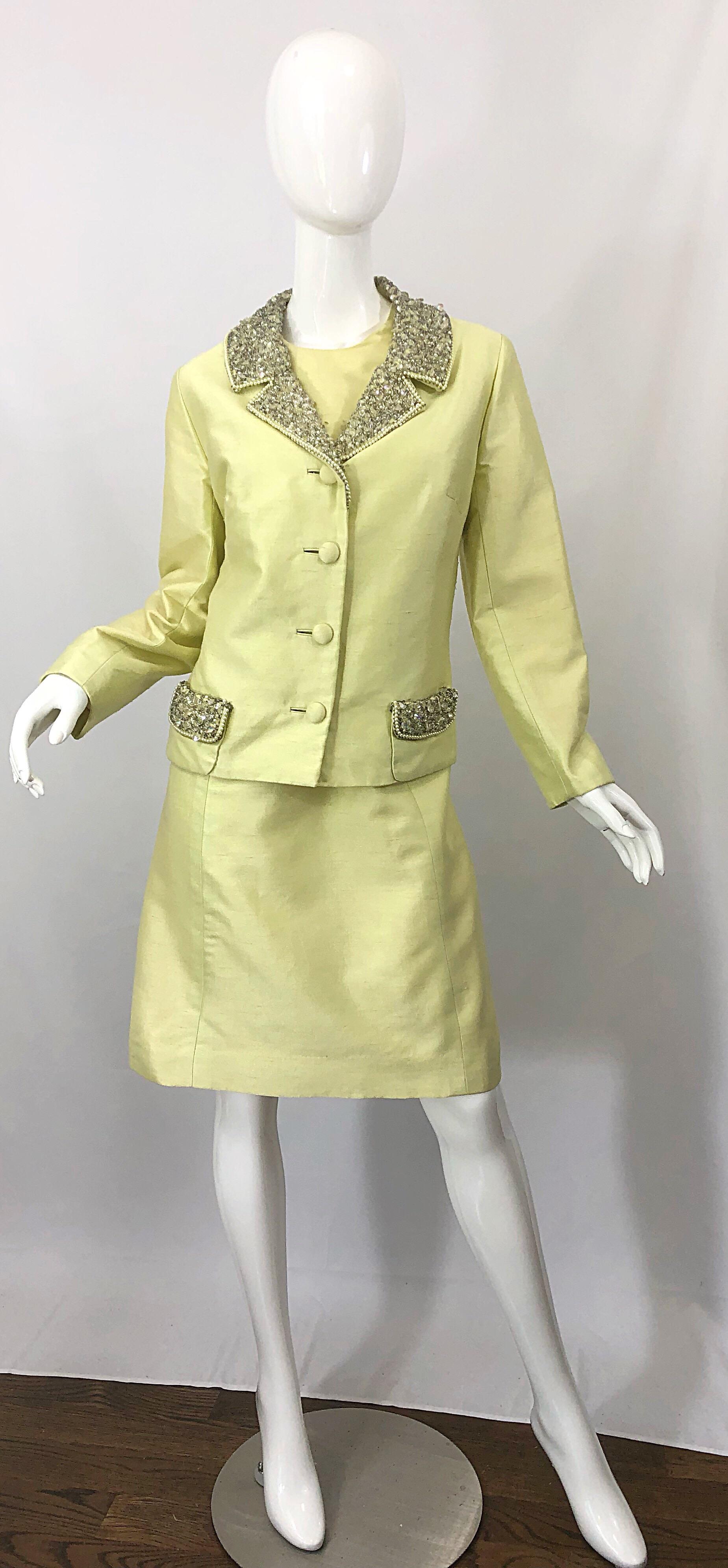 Chic vintage 1960s JACK BRYAN yellow silk shantung A-Line dress and jacket ensemble! Dress features a tailored bodice with a forgiving A-Line shape skirt. Full metal zipper up the back with hook-and-eye closure. Matching jacket has hundreds of