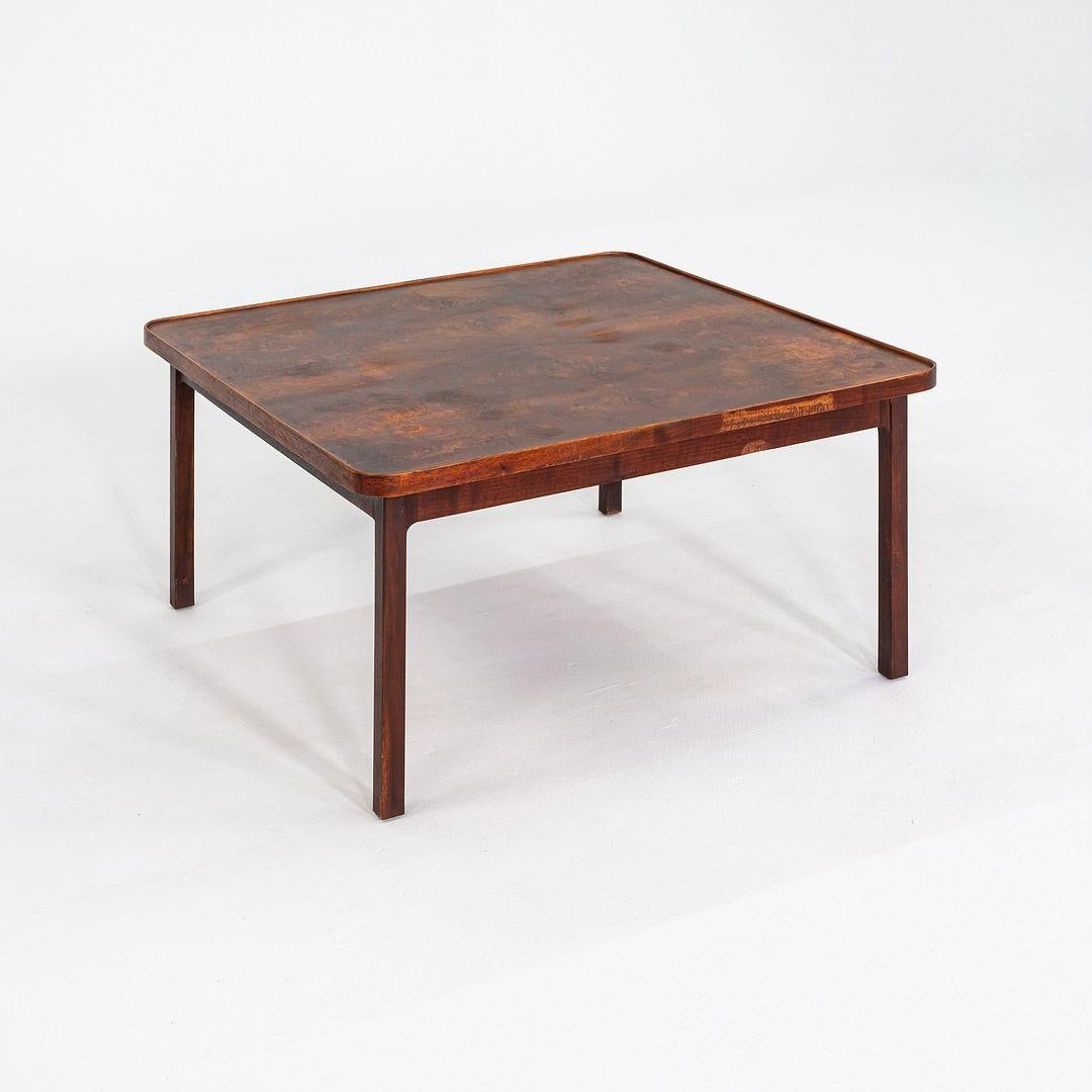This is a square end or coffee table designed by Jack Cartwright for Founders Furniture, produced in the United States in the 1960s. The table is crafted from walnut and features clean, modernist lines characteristic of Cartwright's work during this