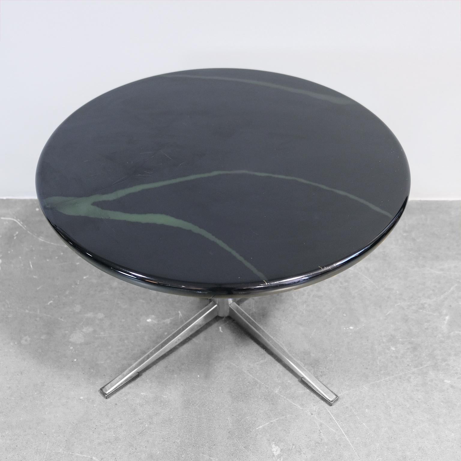 Side table, from the 1960s decade, in Arne Jacobsen style. Top covered with black 