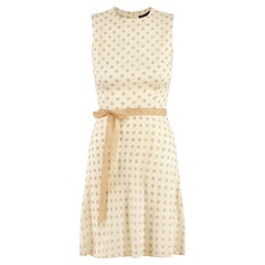 Vestido en línea A de lunares beige y crema de Jaeger de los años 60