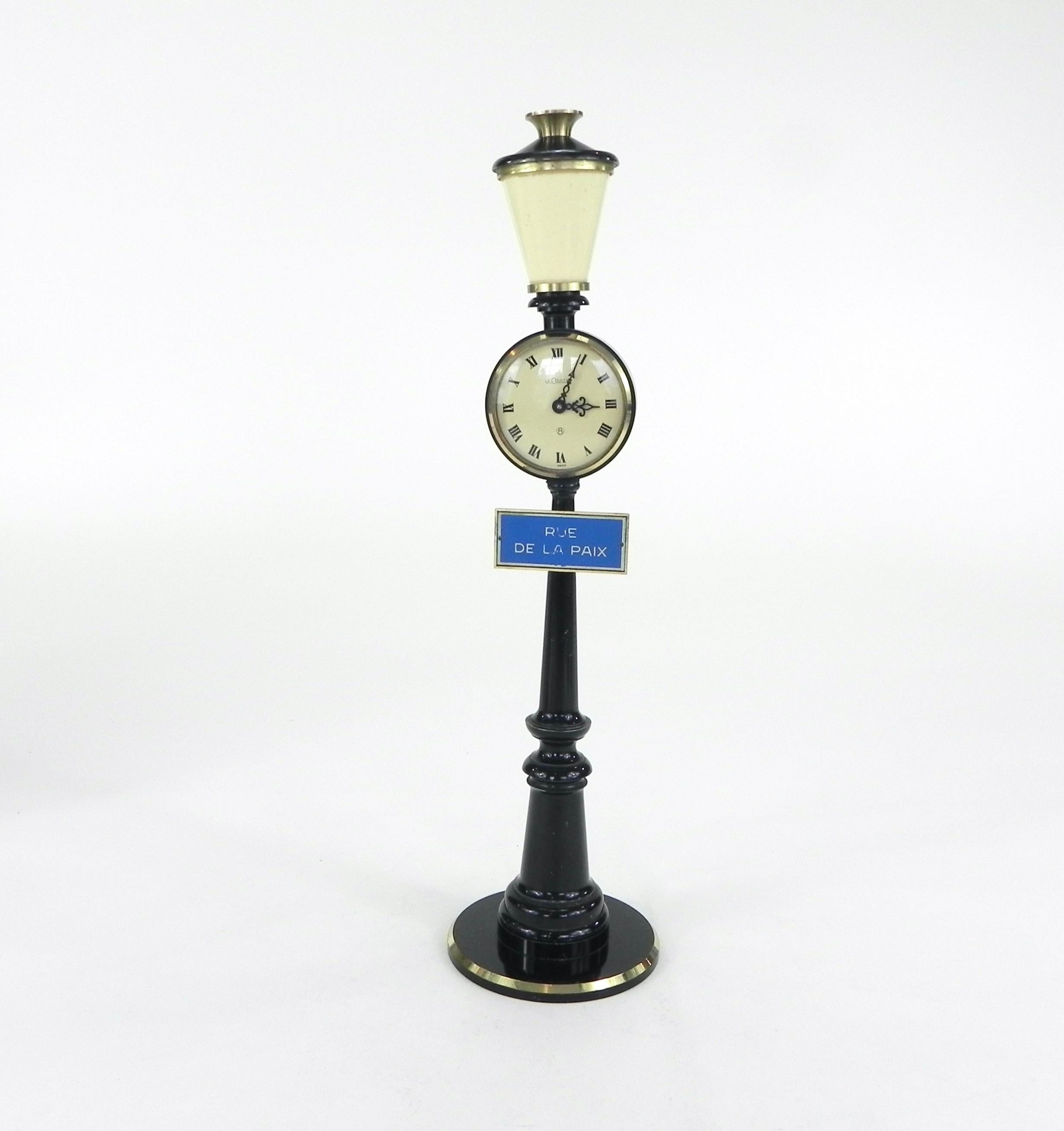 Beautiful vintage Jaeger Le Coultre figural miniature street lamp clock for table top or desktop. It has been tested and it is working.

This clock is in very good condition with minimal to no visible wear. Only the sign 
