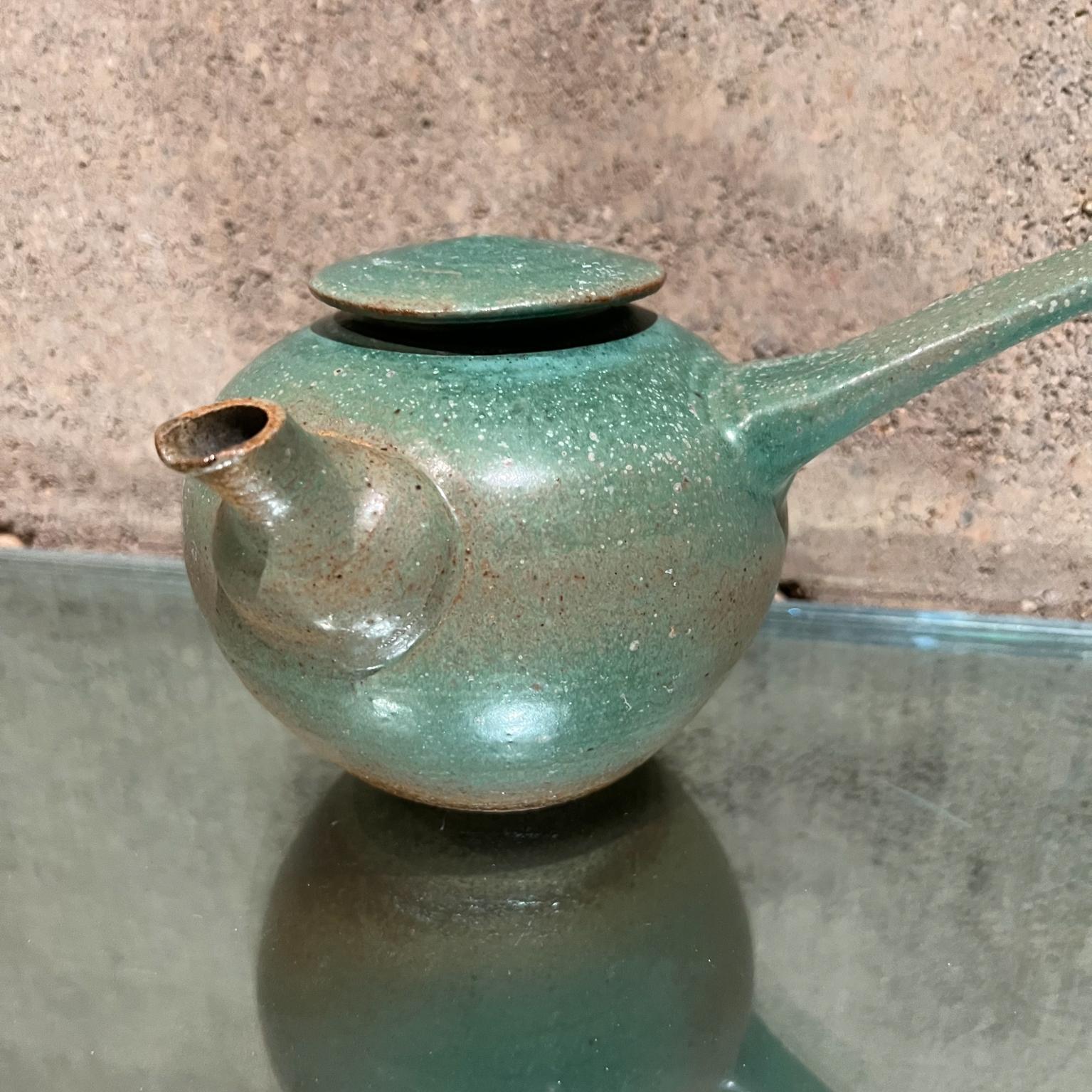 vintage green tea kettle