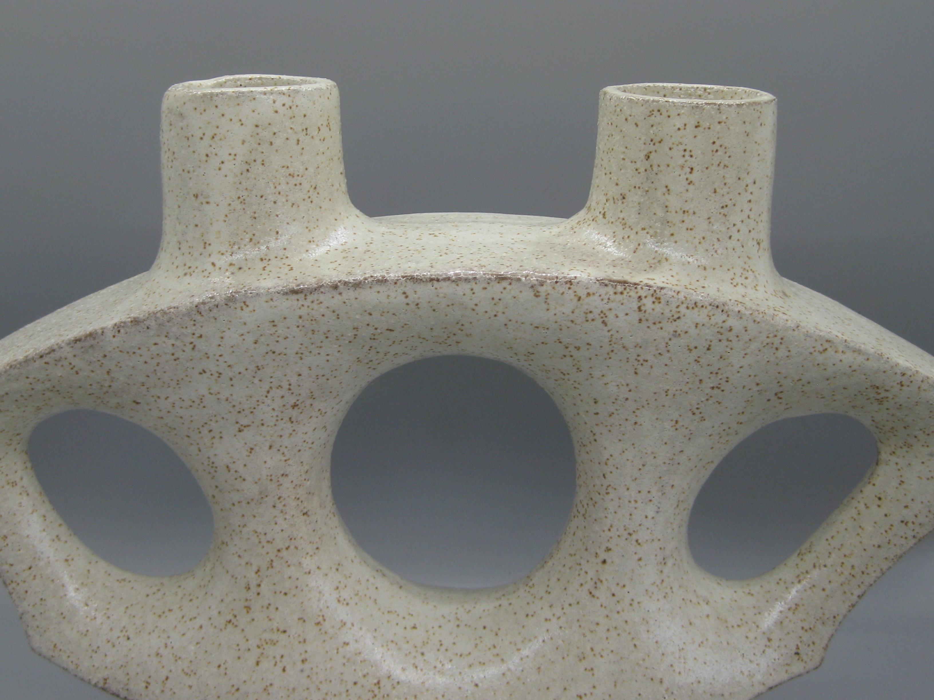Outstanding Japanese modernist Ikebana ceramic/pottery pedestal vase/vessel, circa 1960s. Wonderful form and design. The freeform abstract design is second to none. Has an old Japan paper label on the bottom. In excellent condition for its age. No