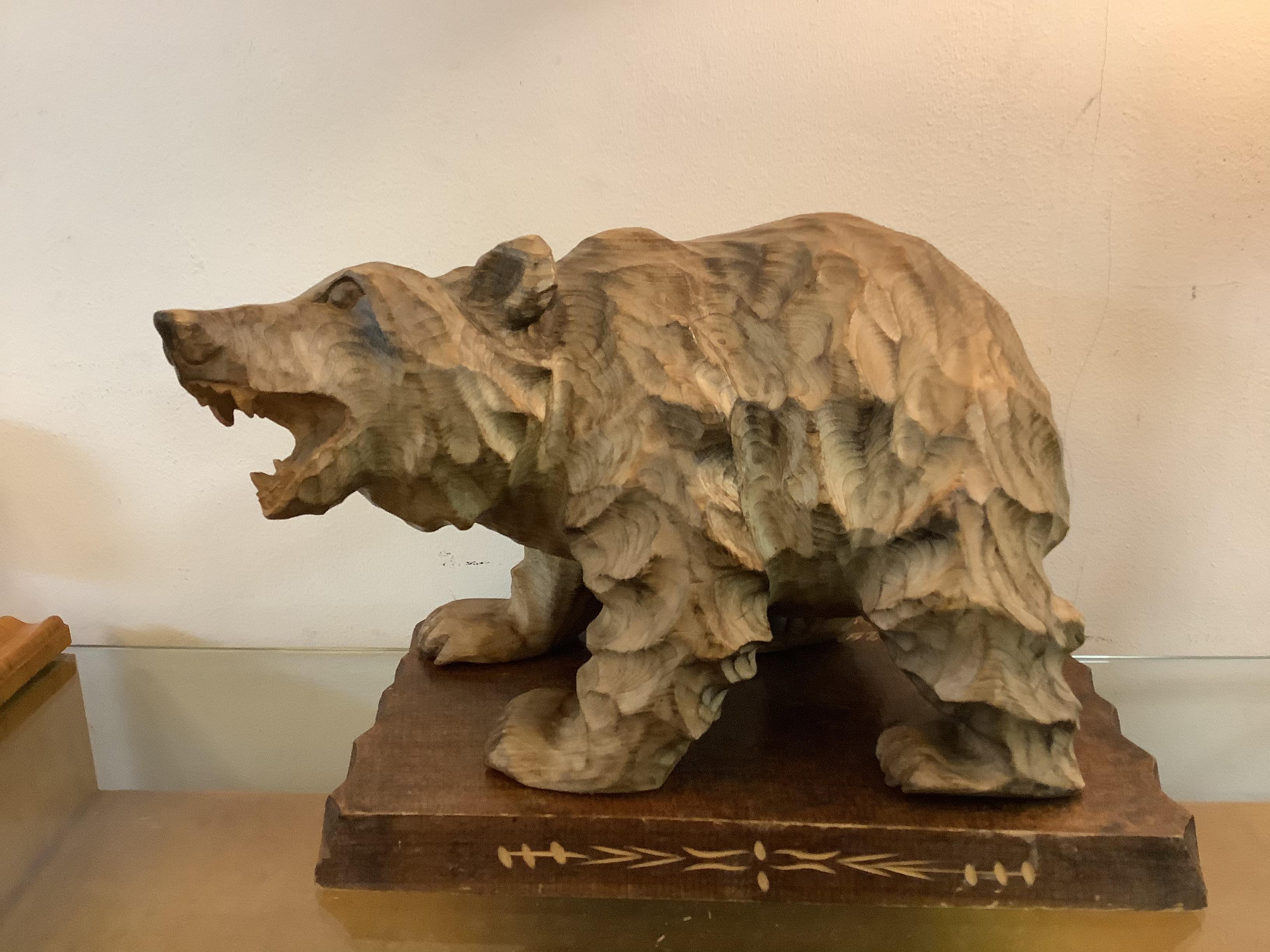 The wooden Bear is an Ainus artisan hand carved from the mid century indigenous people of northern 
Japan living and practicing art on the of Hokkaido

Cc1960’s.
