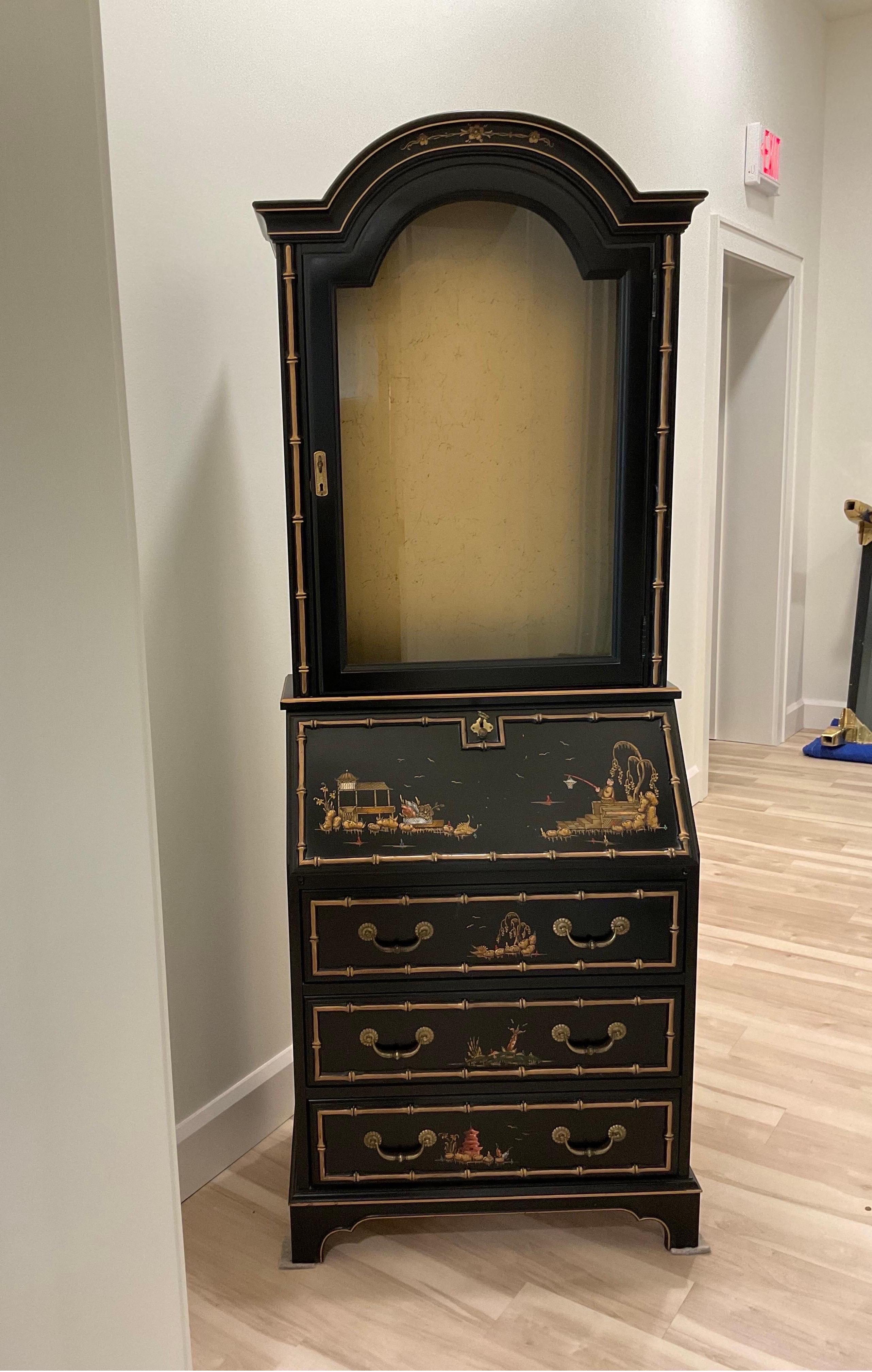 The sweetest Jr Secretary by Jasper Cabinet Co. is 60s chinoiserie in design and nearly perfect in condition if not just that. This little beauty has impeccable details like raised faux bamboo boarders and intricate hand painted Asian scenes.