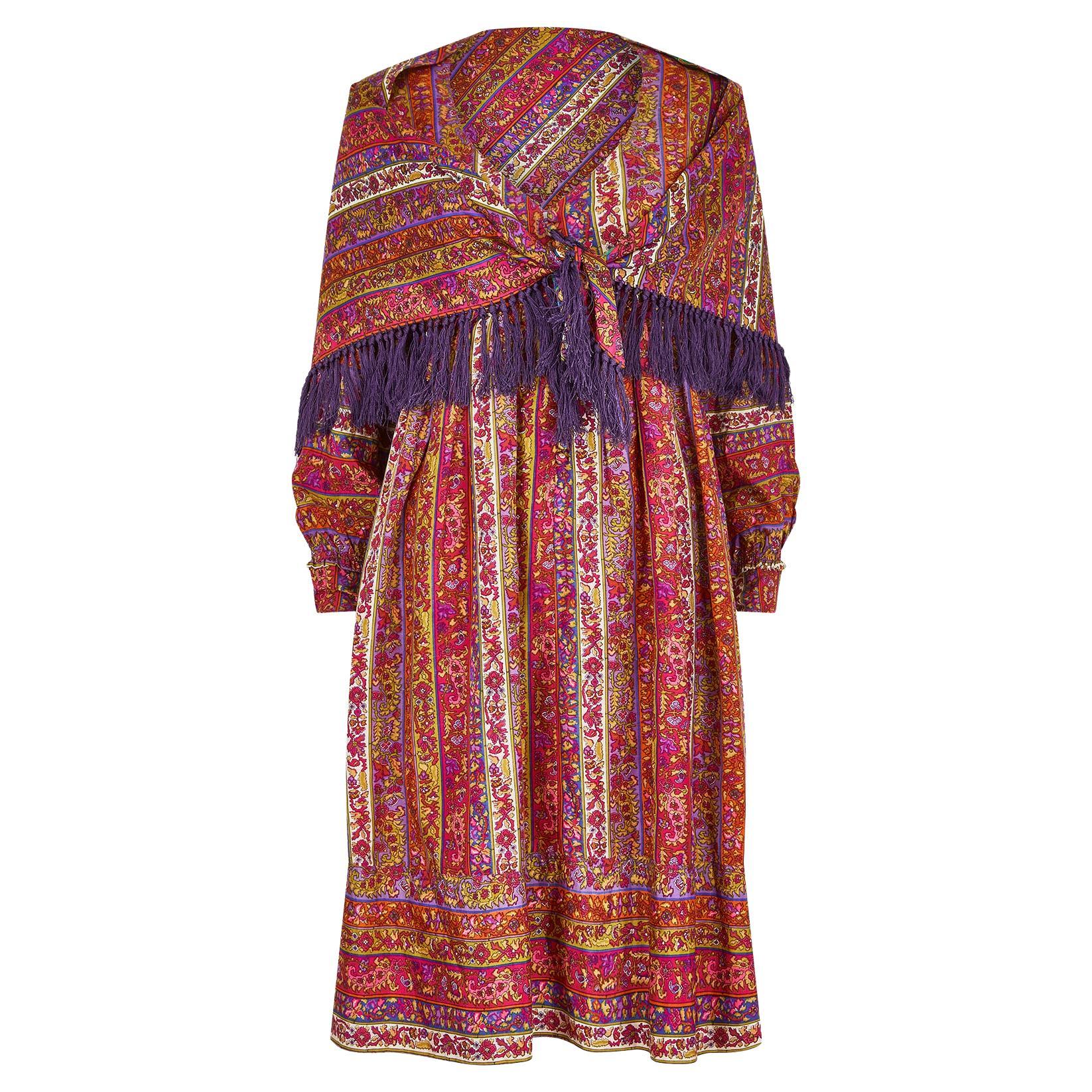 This is a fine Jean Muir 1960s dress and matching tassel scarf and is without question, the best ensemble from this designer we have ever had in our collection.  Early in her career, Muir worked with Liberty fabric and this striking psychedelic silk