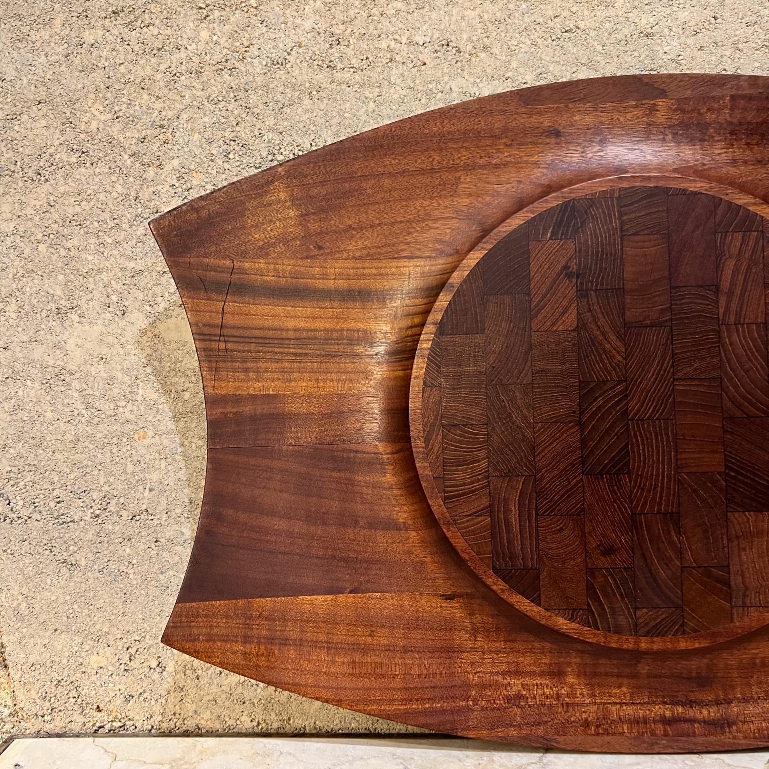 
1960s Jens Quistgaard Dansk Rare Woods Sculpted Modern Tray Denmark
Charcuterie Board Cutting Cheese Platter Serving Piece
Staved Teak
maker stamped
1.5 H 14 D x 19.75 W
Preowned original vintage condition
See images provided