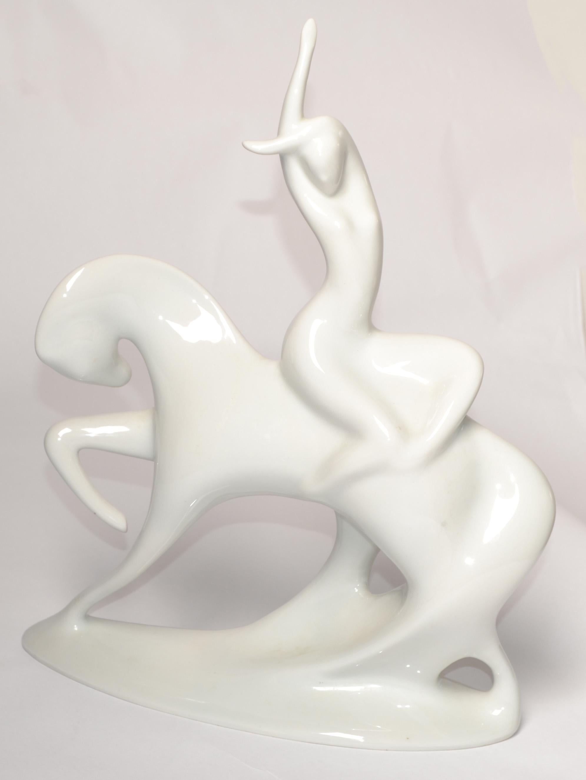 1960s Jitro Porcelain Hand-Painted Statue by Jaroslav Ježek for Royal Dux Bohemia Sculpture made in the Czech Republic circa 1966.
Depicting a Nude Woman riding on a horse. A white high gloss glazed porcelain Figurine, Statue or Sculpture.
Makers