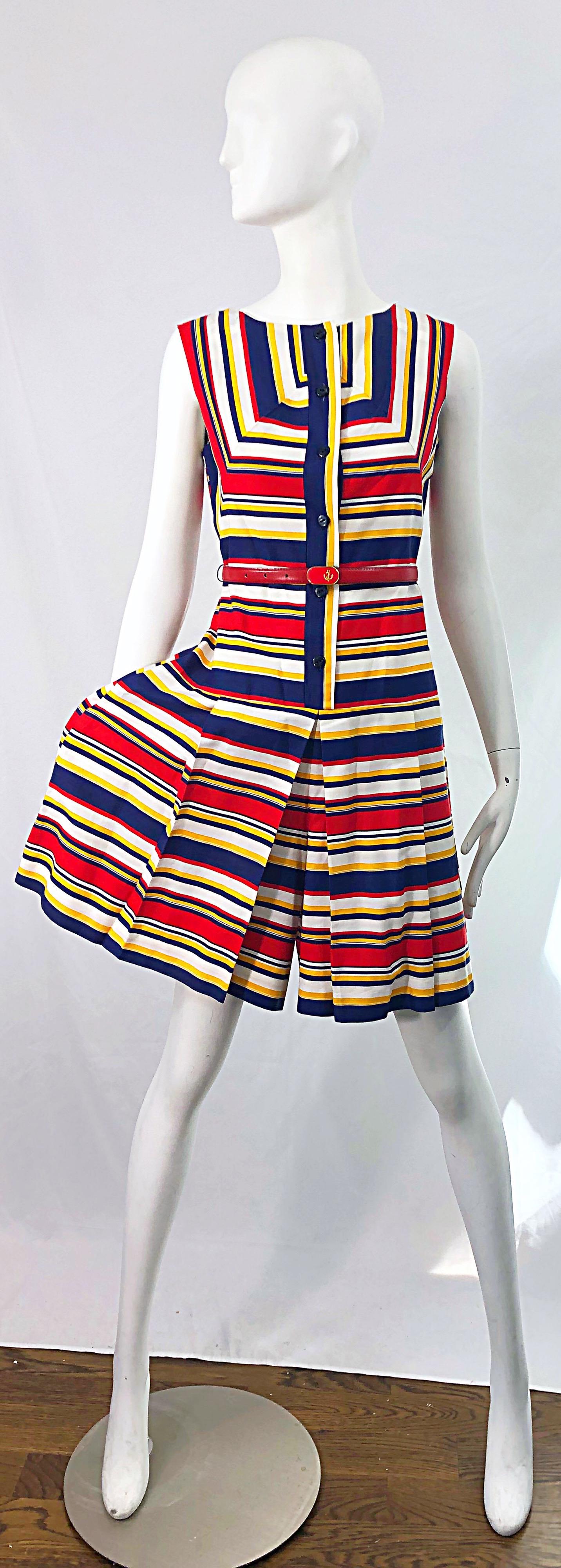 Chic 1960s JOAN CURTIS nautical belted cotton romper ! I thought this was a dress when I initially purchased this, but was pleasantly surprised when I went to photograph it, and realized that it was a romper! Features navy blue, red, yellow and