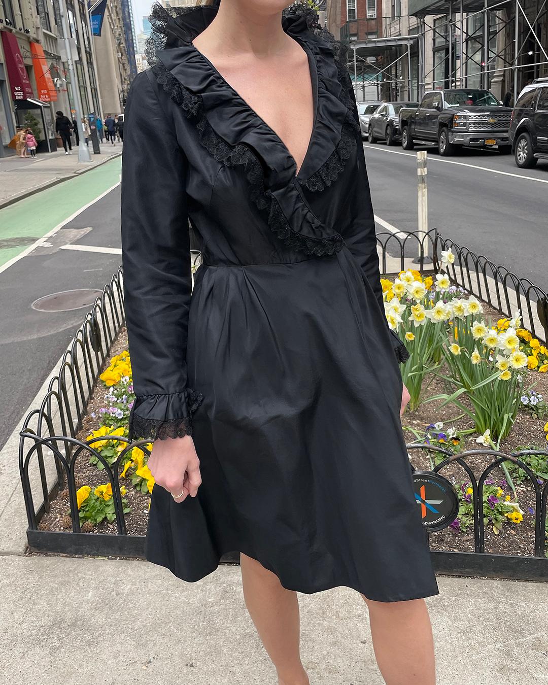 This dress is so incredibly timeless and chic: exactly the kind of piece you want to invest in, that you'll never tire of wearing. Made by Joseph Magnin in the 1960s, it's made of lustrous silk taffeta fabric, with a nipped waist, full skirt, and