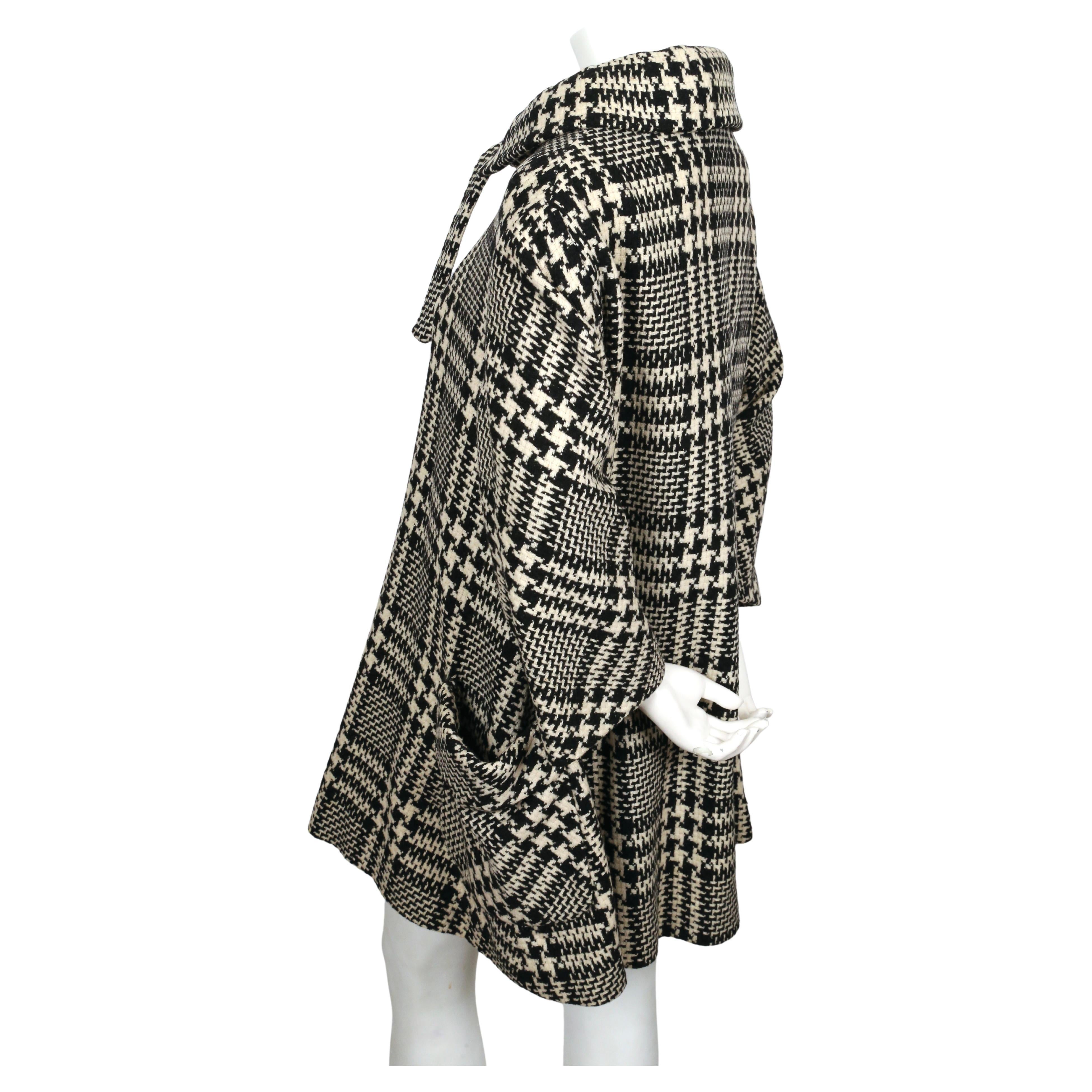 Black 1960's JOSEPH MAGNIN wool houndstooth swing coat with neck tie & skirt For Sale