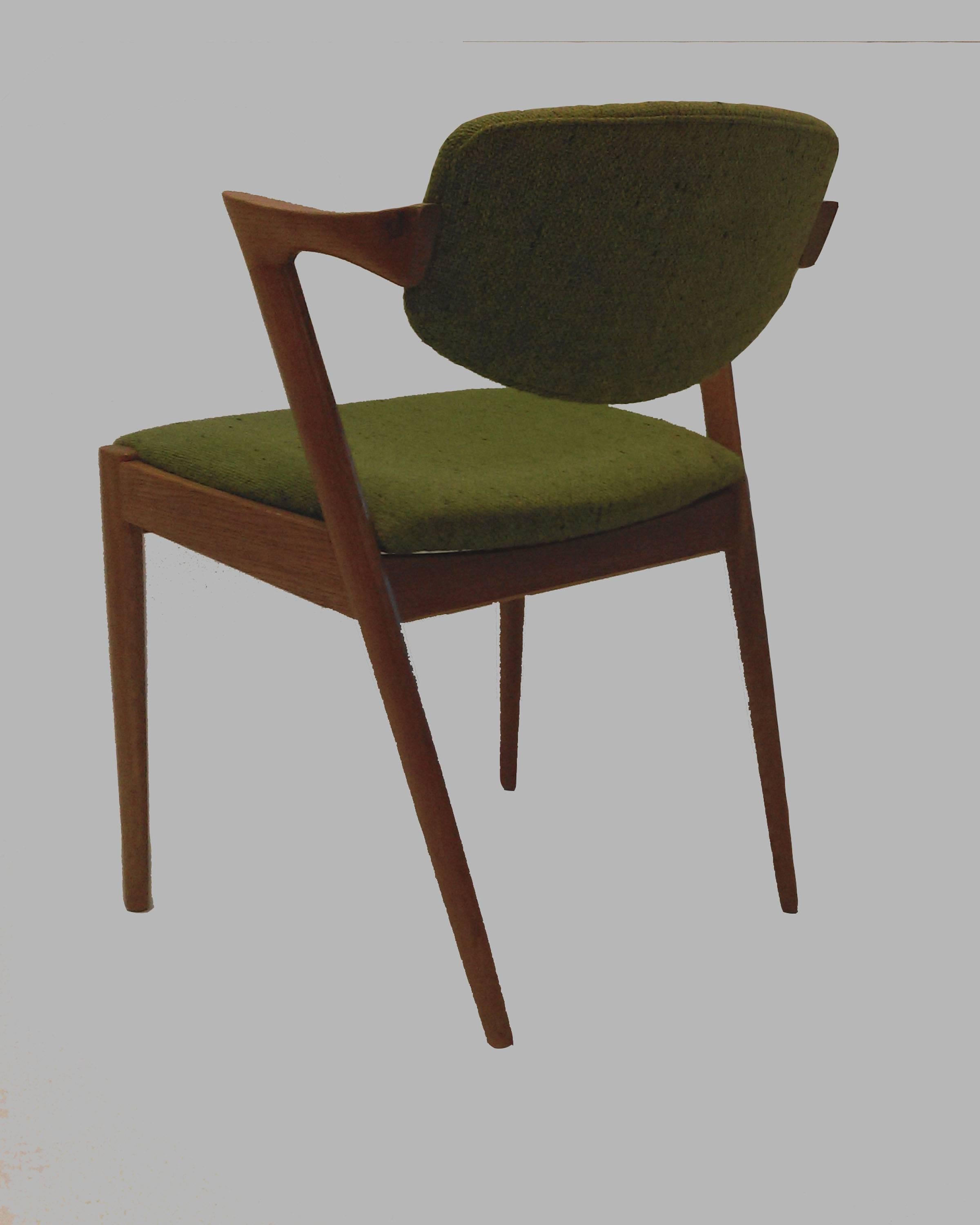 Danish Kai Kristiansen Twelve Refinished Dining Chairs in Oak, Inc. Reupholstery For Sale