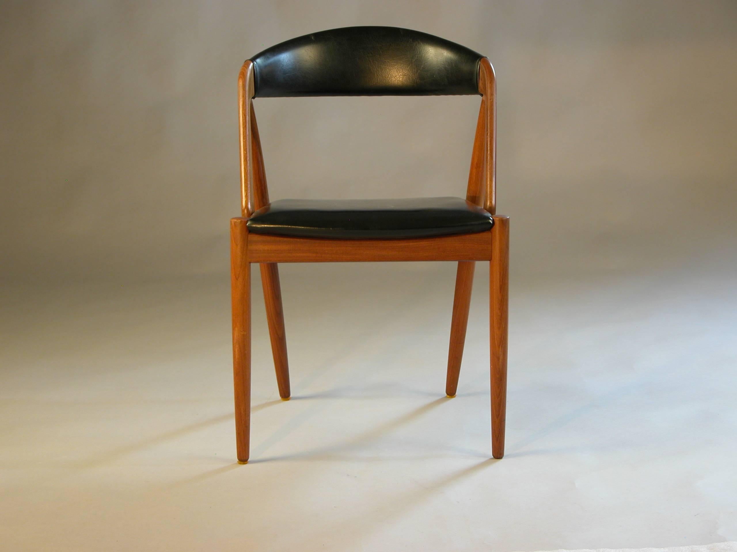 Kai Kristiansens model 31 dining chairs with refinished frames and leatherette upholstery.

The A-frame model 31 chairs were designed by Kai Kristiansen in 1956. The model with its curved, straight and oblique lines and comfortable seats are one of