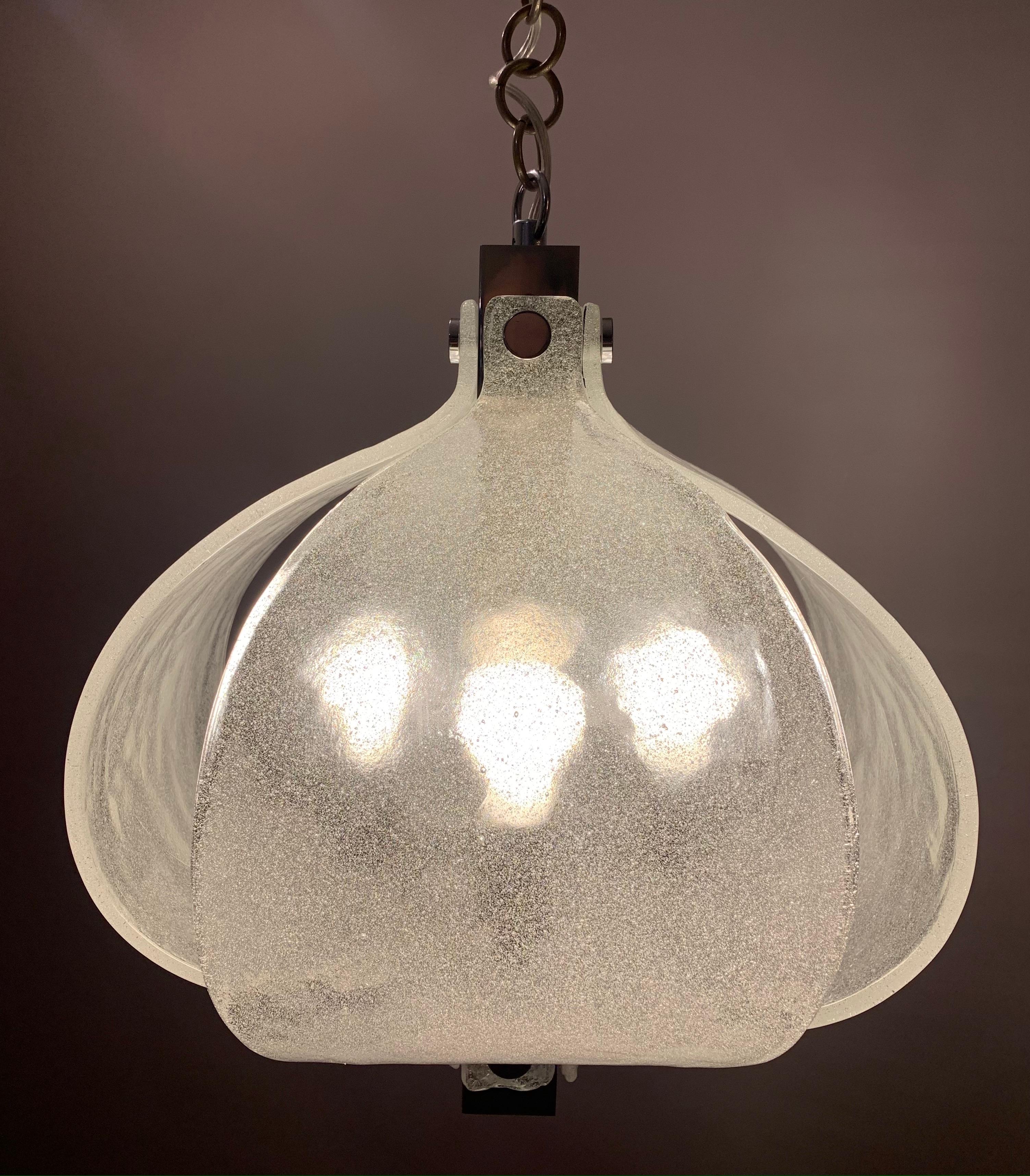 A stunning, striking and unusual 1960s German Kaiser Leuchten chrome and Murano frosted/iced, hand blown glass ceiling pendant light. The four semicircular, sculptural glass shades, are fixed to a rectangular chrome support, with a feature chrome