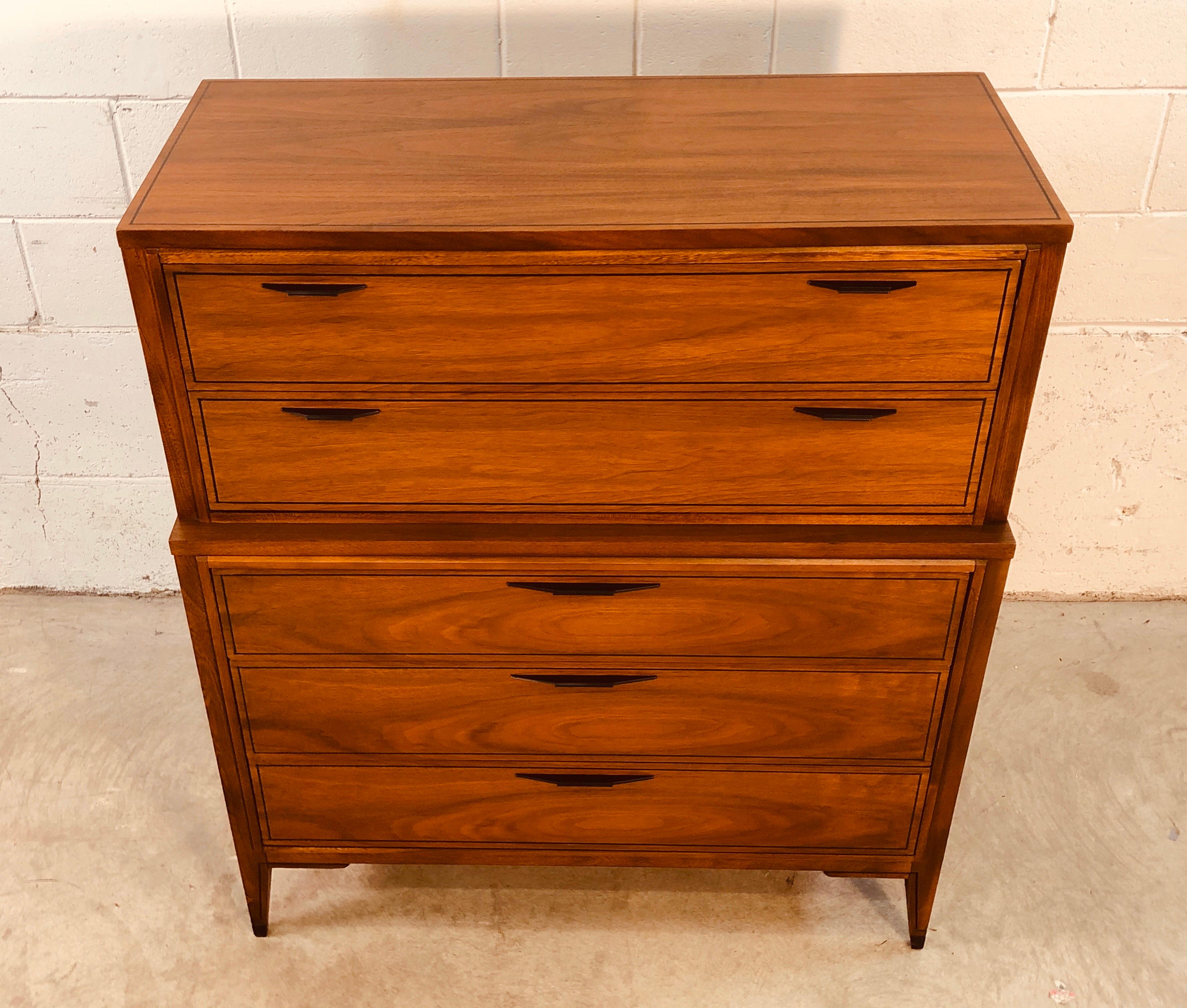 Vintage 1960s tall walnut and elmwood dresser by Kent Coffey for the Tempo line. The dresser has 5 drawers for storage. Two drawers are 4.25” H and three drawers are 5.5” H. Black metal pulls have been refinished. Excellent condition.
