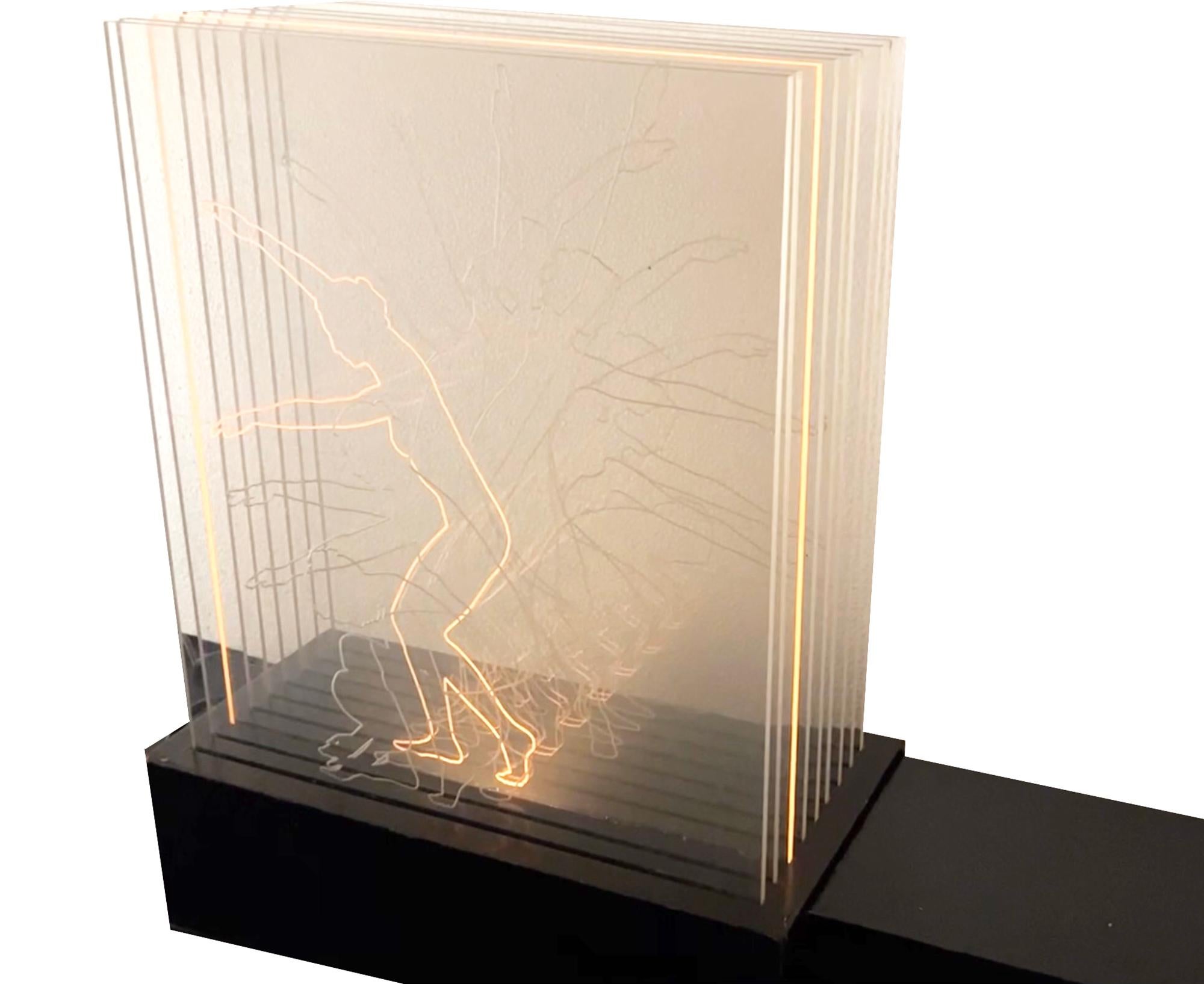 One of a kind, artist handmade sculpture box with sequential dance positions (from crouch to standing and back) etched in plexiglass panels. Kinetic action happens when light moves from front to back. There is a dial on the transformer that controls