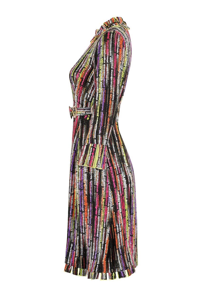 This sensational 1960s woven wool dress with matching belt is labelled Klevenhands and although we are uncertain of its origin, it is undoubtedly couture. The dress is long sleeved and mid calf length with a round neckline and a simple tailored