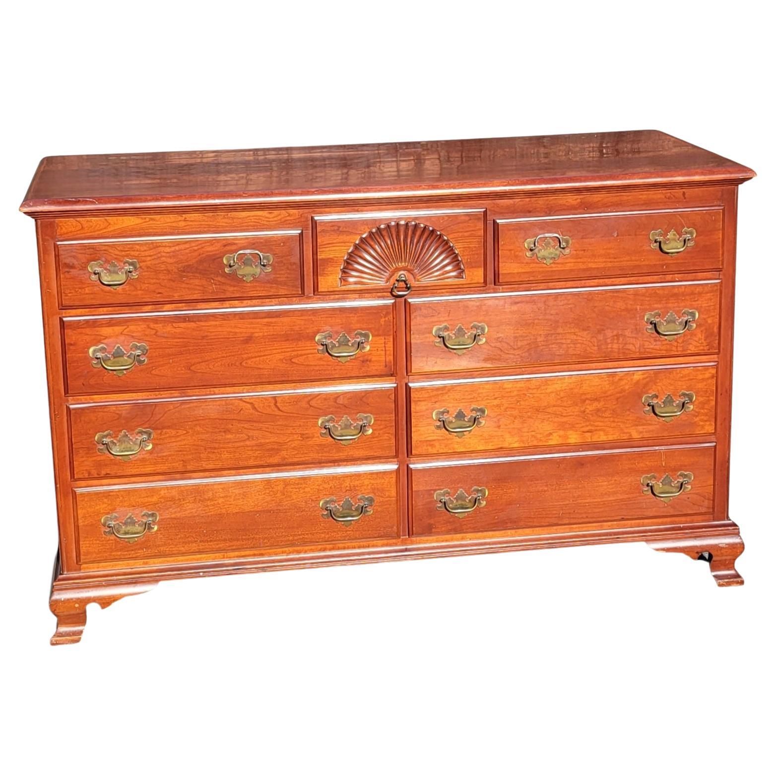1960s Kling Factories' solid genuine cherry chippendale double dresser. 9 Dovetail joints drawers perfectly functioning, two of which are divided. Half bull nose top edge cut on the front and sides.
Clean vintage with wear cinsistent with age and