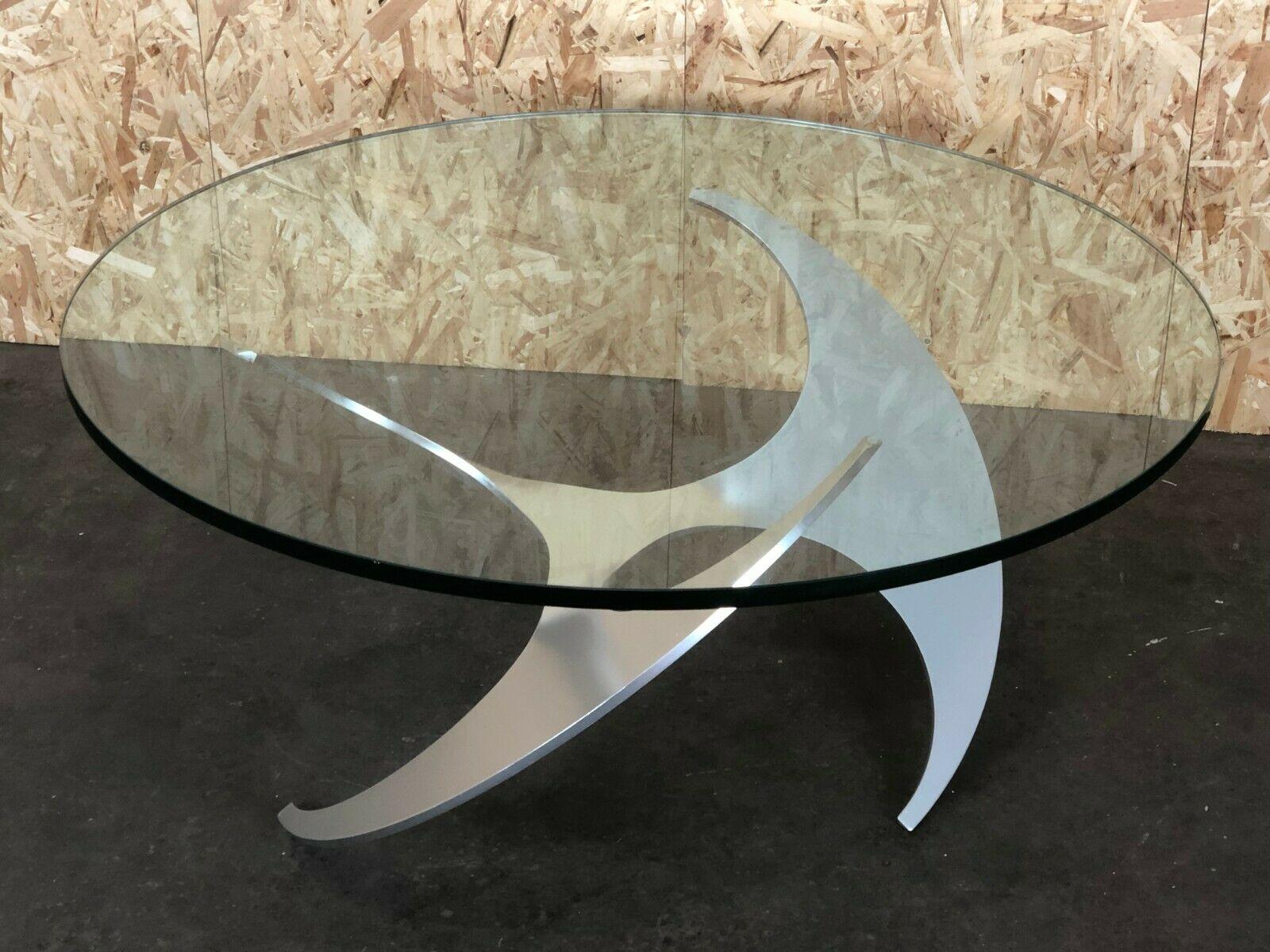 1960s Knut Hesterberg Ronald Schmitt Propeller coffee table Alu

Object: coffee table

Manufacturer:

Condition: good - vintage

Age: around 1960-1970

Dimensions:

Diameter = 110cm
Height = 49cm
Plate thickness = 2cm

Other