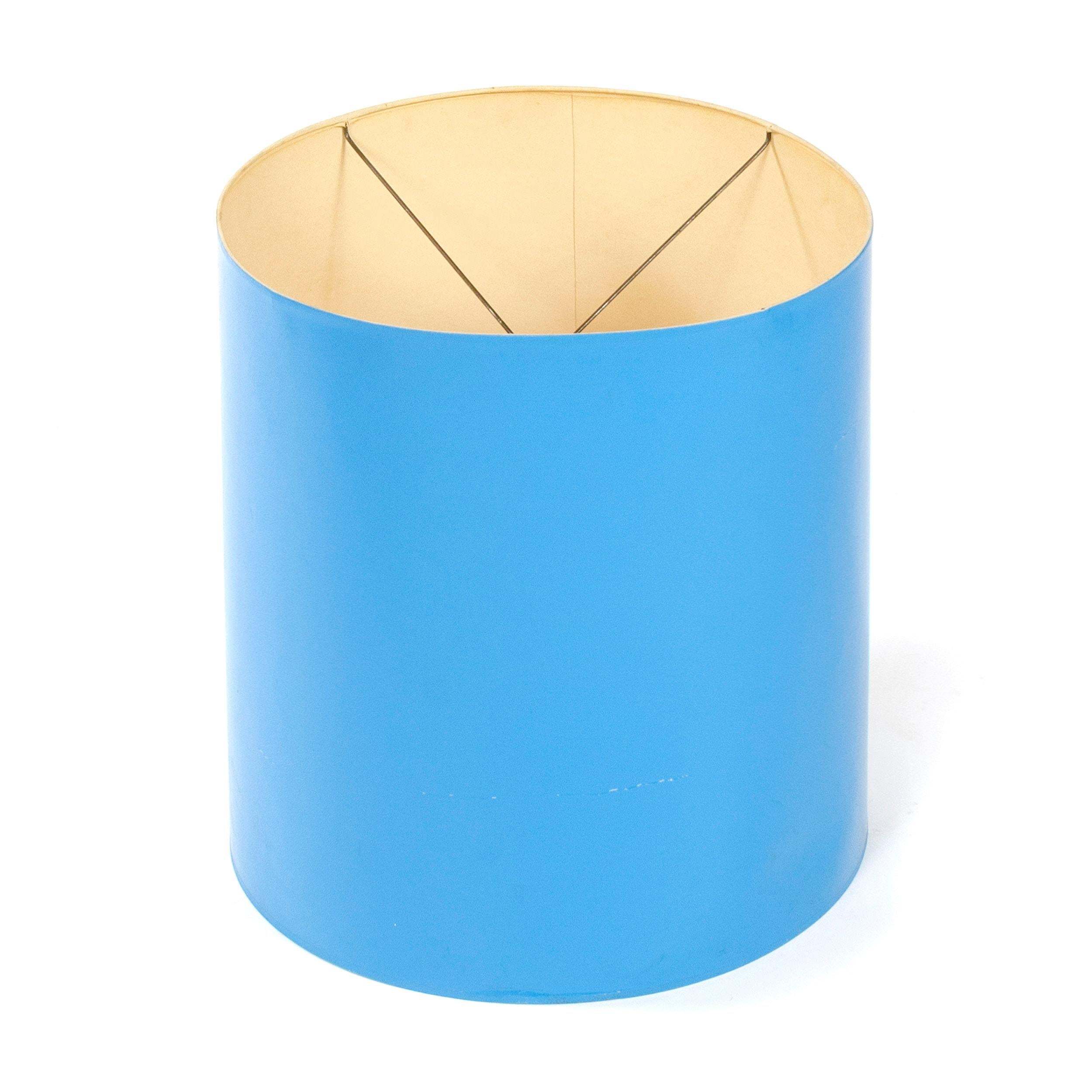 A vibrant, blue lacquered drum shade.
